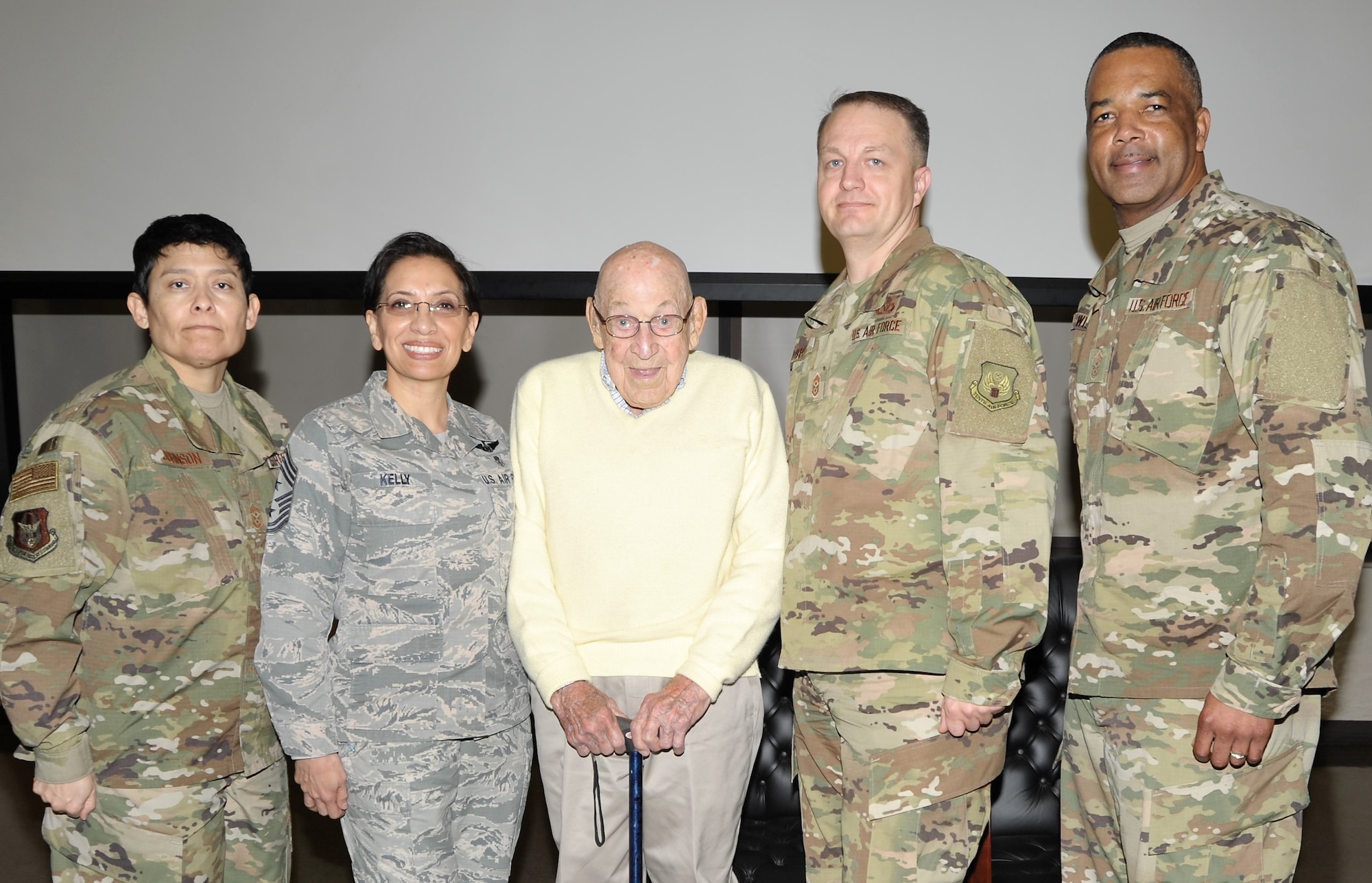 Retired Lt. Col. Dick Cole, the last living member of the World War II Doolittle Raiders, poses with Reserve Citizen Airmen command chief master sergeants following the pre-basic military training graduation Airman’s coin ceremony at Joint Base San Antonio-Lackland, Texas Dec. 13. Pictured with Colonel Cole are (left to right) Chief Master Sgt. Imelda Johnson, 22nd Air Force command chief; Chief Master Sgt. Ericka Kelly, Air Force Reserve Command command chief; Chief Master Sgt. James Loper, 10th Air Force command chief; and Chief Master Sgt. Timothy White, 4th Air Force command chief. (U.S. Air Force photo by Debbie Gildea)