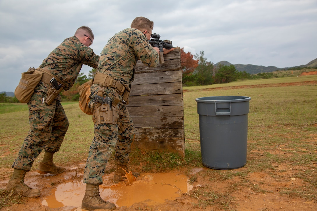 U.S. Marines competing in the Far East Marksmanship Competition engage targets at Range 18 on Camp Hansen, Okinawa, Japan Dec. 13, 2018. The competitors engaged targets up to 300 meters.