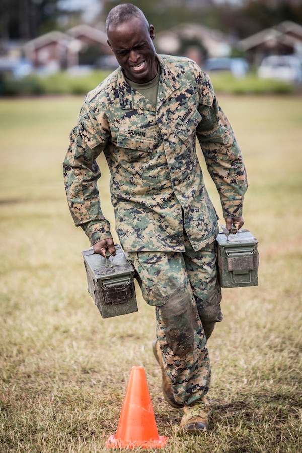 Col. Gerald C. Graham, the chief of staff with 4th Marine Aircraft Wing, Marine Forces Reserve conducts the maneuver under fire portion of the Combat Fitness Test at Marine Corps Support Facility New Orleans, Dec. 14, 2018. The CFT assesses a Marine’s strength, stamina, agility and coordination through combat related tasks. (U.S. Marine Corps photo by Cpl. Tessa D. Watts)
