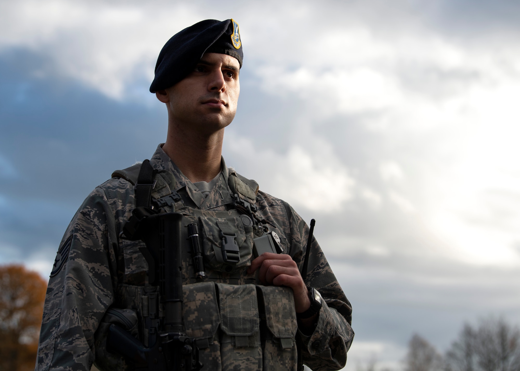 U.S. Air Force Staff Sgt. Jacob LaFlamme, 701st Munitions Support Squadron Custody Forces flight sergeant, poses for a photo at Kleine Brogel Air Base, Belgium, Dec. 4, 2018. His identical twin brother,  Zachary LaFlamme, is stationed two-and-a-half hours away. Jacob joined the Air Force to try something new after working as a mechanic and was inspired by his military family. (U.S. Air Force photo by Airman 1st Class Valerie Seelye)