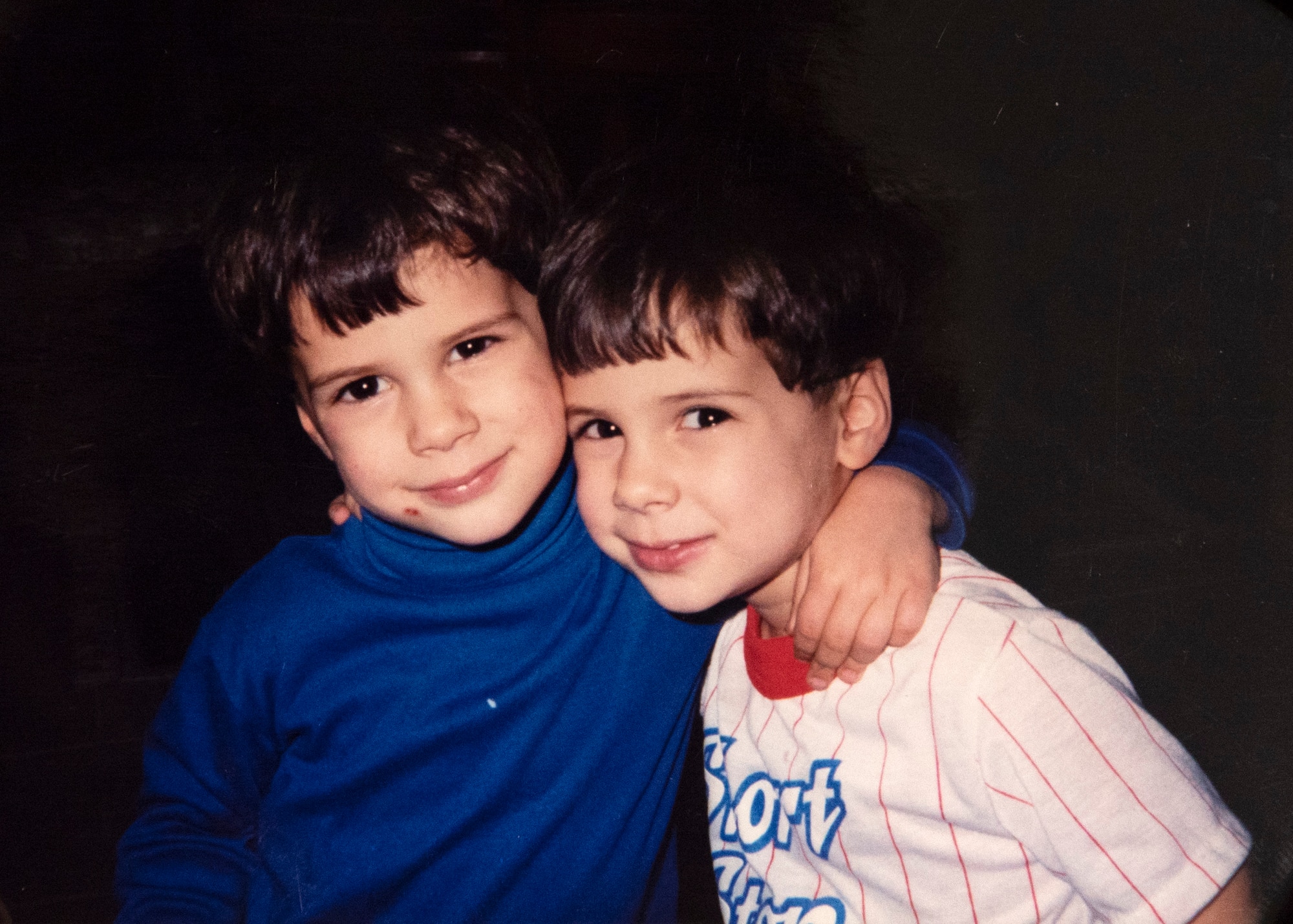 Five-year-old identical twins, Jacob LaFlamme, left, and Zachary LaFlamme, right, pose for a photo. The brothers are now both U.S. Air Force staff sergeants who hold the same job, certifications, and are both stationed at 52nd Fighter Wing geographically separated units. (Courtesy photo provided by Staff Sgt. Zachary LaFlamme)