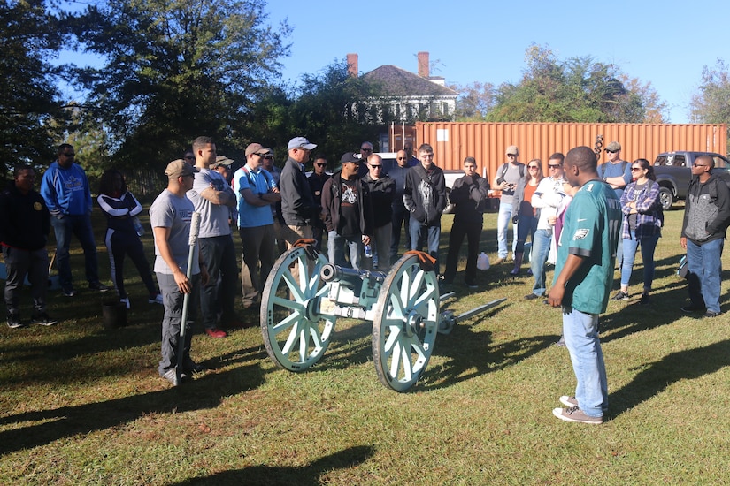Staff members of the 4th Battlefield Coordination Detachment and 609th Air Operations Center receive a brief on cannon crew drills that were used during the Revolutionary War in Camden, South Carolina, November 7, 2018. Attendees visited Camden Battlefield and Camden Historical district as part of a staff ride designed to further professional leader development.