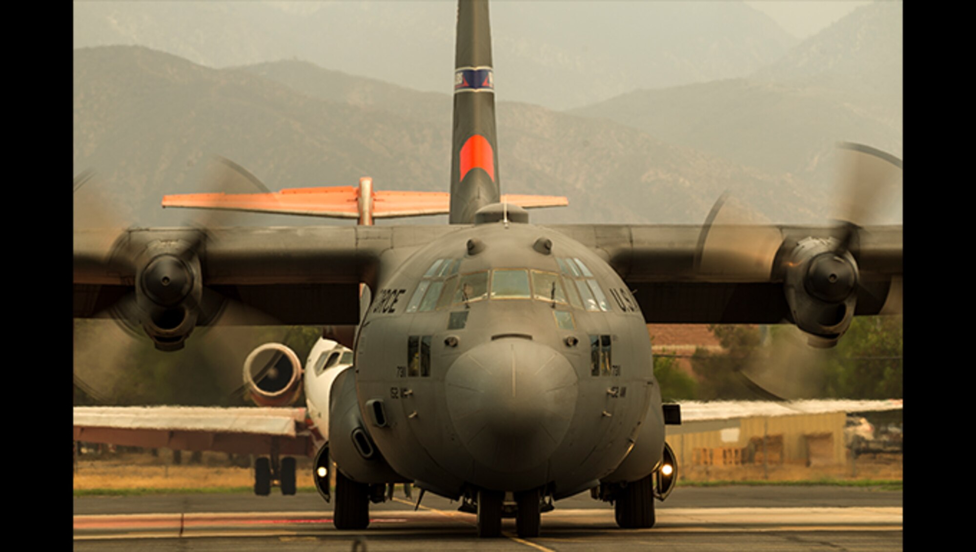 MAFFS 9, a modular airborne firefighting system-equipped C-130 from the 152nd Airlift Wing, Nevada Air National Guard, taxis after picking up a load of fire retardant, Wednesday, August 8, 2018, at the U.S. Forest Service San Bernardino Airtanker Base in San Bernardino, California, while battling the Holy Fire in Southern California. The crew consisted of specially-trained Air National Guardsmen from the Nevada and Wyoming Air National Guards. (U.S. Air National Guard photo by Senior Airman Crystal Housman)