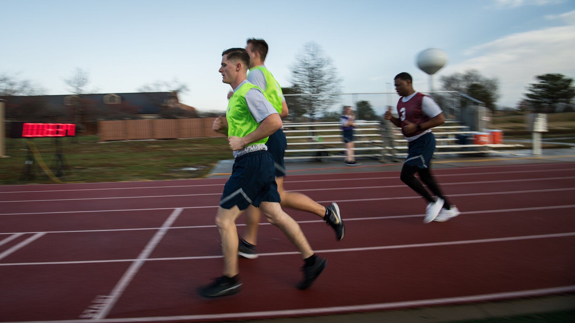 Sunny weather makes for better fitness runs during December unit training assembly.