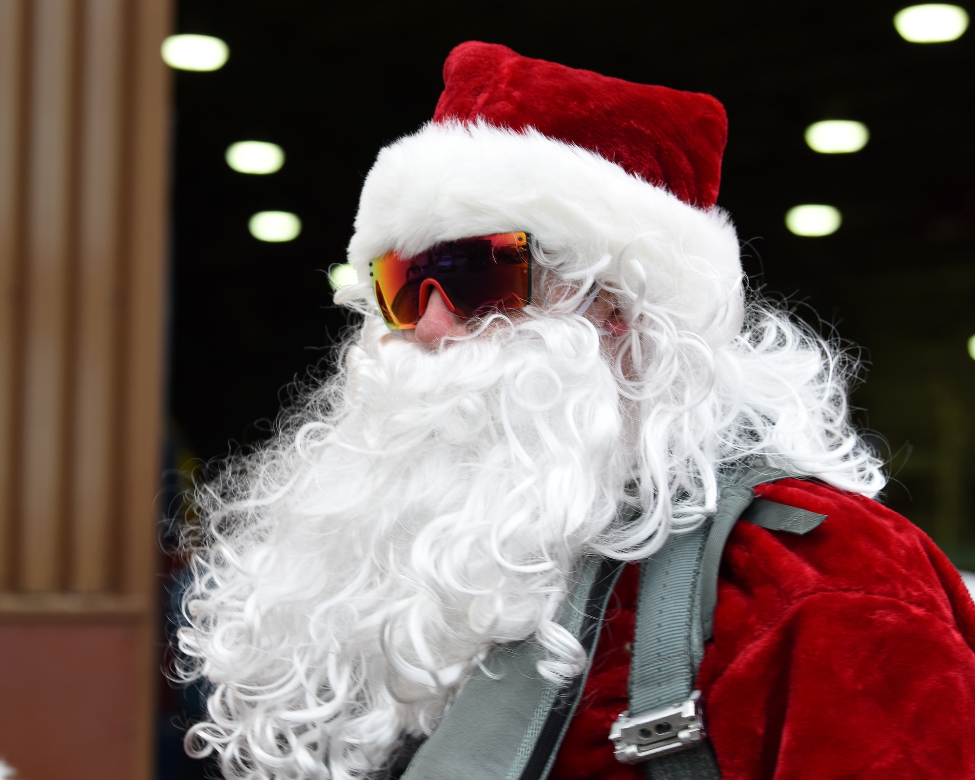 Santa Claus visits Liberty Wing families during the 48th Fighter Wing Children’s Holiday Party at Royal Air Force Lakenheath, England, Dec. 15, 2018. Mr. Claus arrived to the party in an F-15E Strike Eagle. (U.S. Air Force photo by Madeline Herzog)