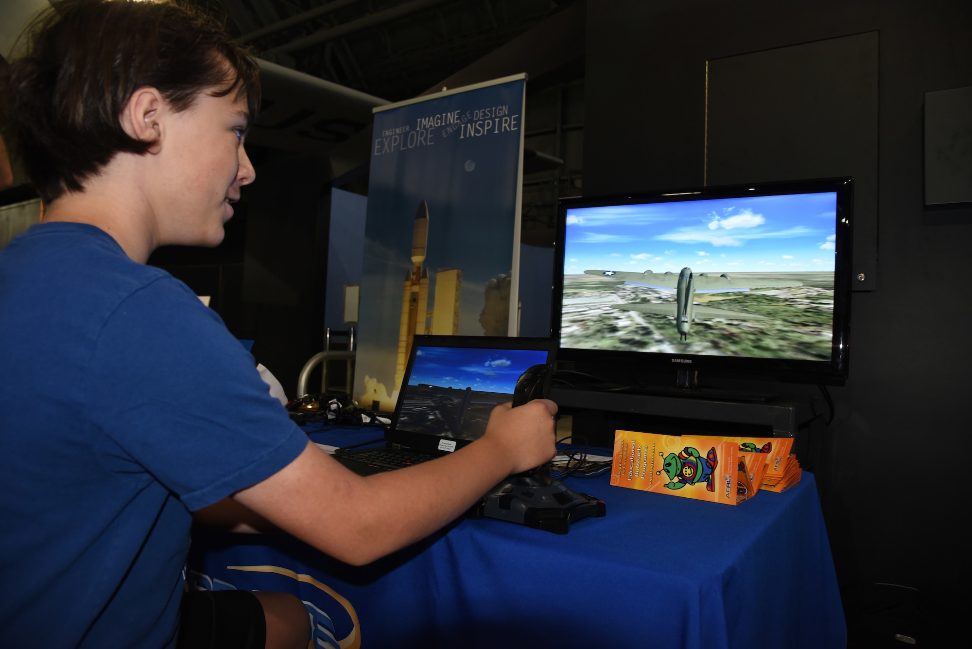 DAYTON, Ohio -- A museum visitor using a flight simulator at the National Museum of the U.S. Air Force. (U.S. Air Force photo)