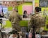 U.S. Army Soldiers check-out at the Fort Richardson Thrift Shop, Joint Base Elmendorf-Richardson, Alaska Dec. 12, 2018. Since the shop’s debut in the 1950s the thrift shop has experienced numerous changes in location, programs, and recently in 2015, management. Currently, the non-profit store is managed by the Richardson’s Spouses Club and mostly run by volunteers.