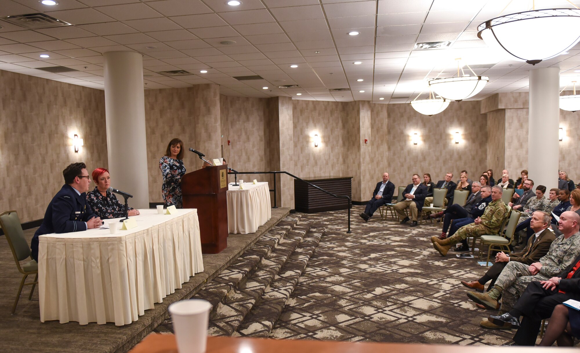 An allied partner of Team Buckley addresses Aurora Defense Council members during an ADC meeting December 13, 2018, at the Double Tree by Hilton in Aurora, Colorado.