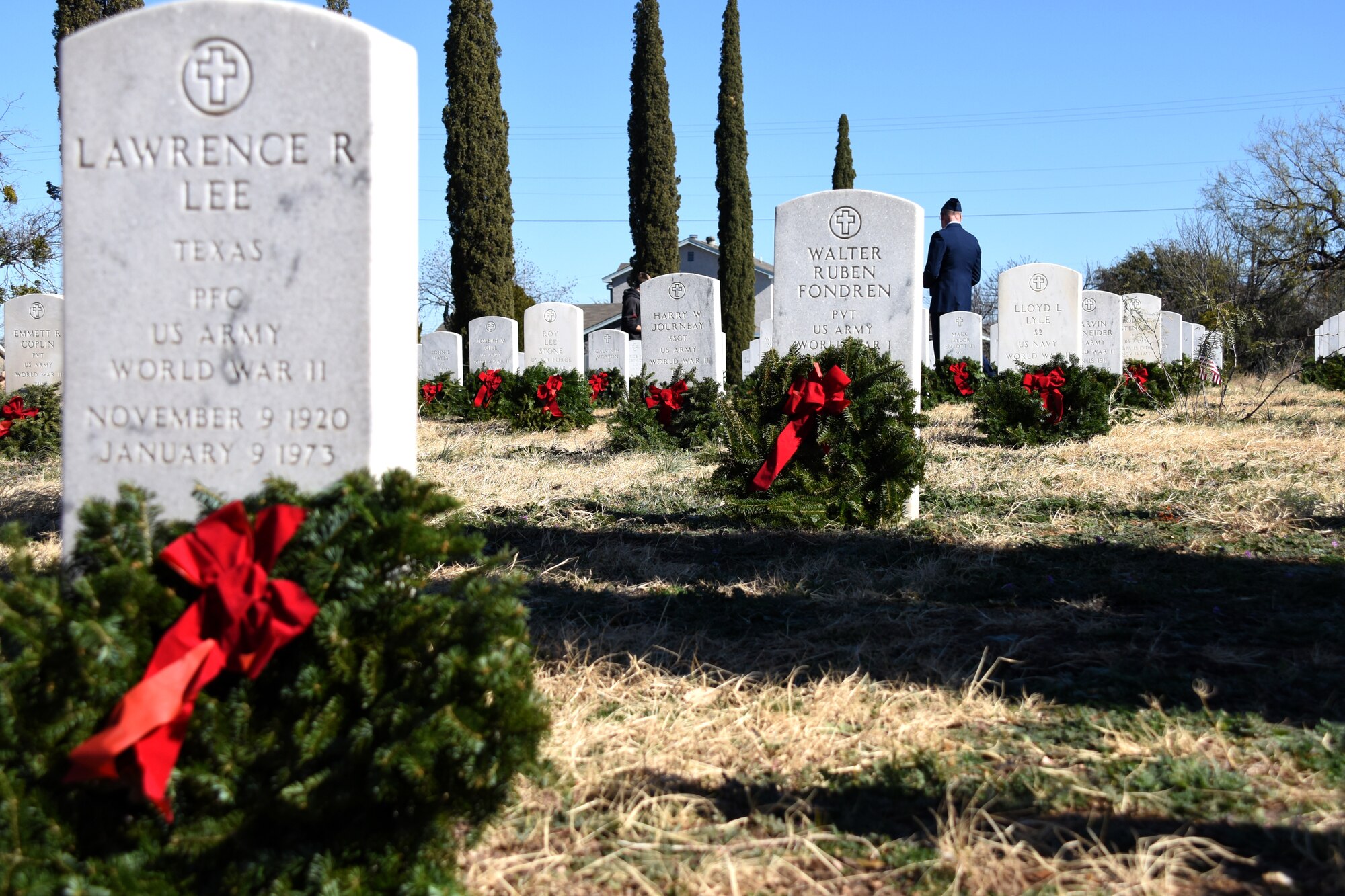 Wreaths adorn the gravestones of veterans at the Belvedere Memorial Cemetery after the Wreaths Across America event in San Angelo, Texas, Dec. 15, 2018. This year the San Angelo Composite Squadron was able, through donations, to provide 379 wreaths for volunteers. (U.S. Air Force photo by Airman 1st Class Seraiah Hines/ Released)