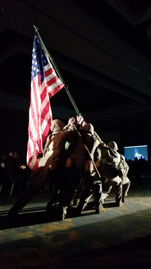 U.S. Marines with 3rd Marine Aircraft Wing perform an Iwo Jima flag raising reenactment during the 3rd MAW Marine Corps birthday ball, Nov. 2, at the Marriott Marquis Hotel in San Diego, Calif. Sgt. Maj. Ronald Green, the 18th sergeant major of the Marine Corps, attended the 3rd MAW ball as the guest of honor and spoke about the importance of taking care of each other and how valuable each Marine is to mission accomplishment. (U.S. Marine Corps photo by Lance Cpl. Levi J. Guerra)