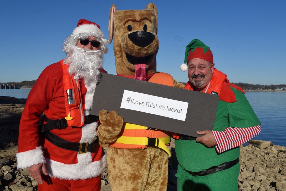 Safety Santa, Bobber the Water Safety Dog, and Hap “Hazard” the Elf film a holiday safety public service announcement Dec. 17, 2018 at J. Percy Priest Lake in Nashville, Tenn., to encourage the public to be vigilant and safe at home this Christmas and when visiting and recreating at Corps of Engineers lakes. (USACE photo by Lee Roberts)