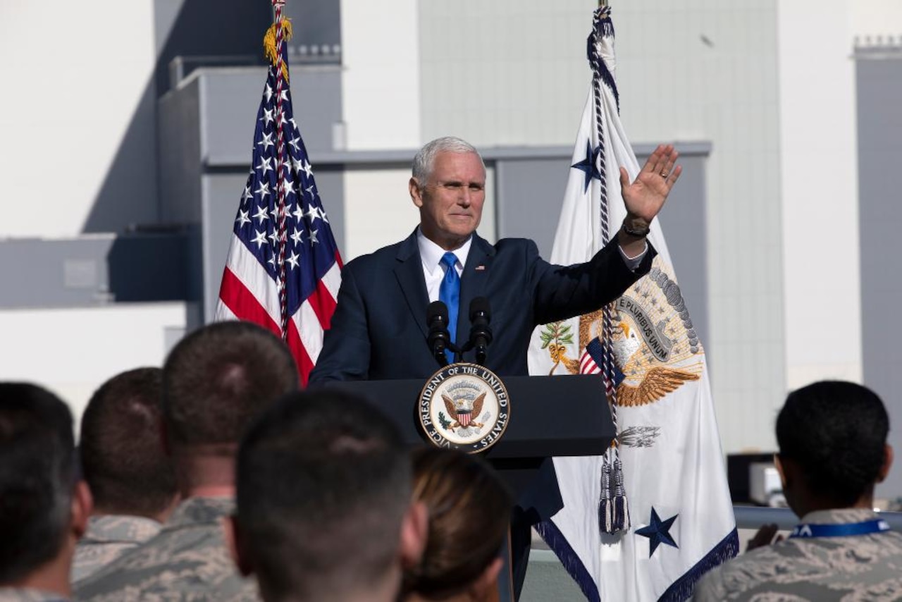 Vice President Mike Pence standing on stage