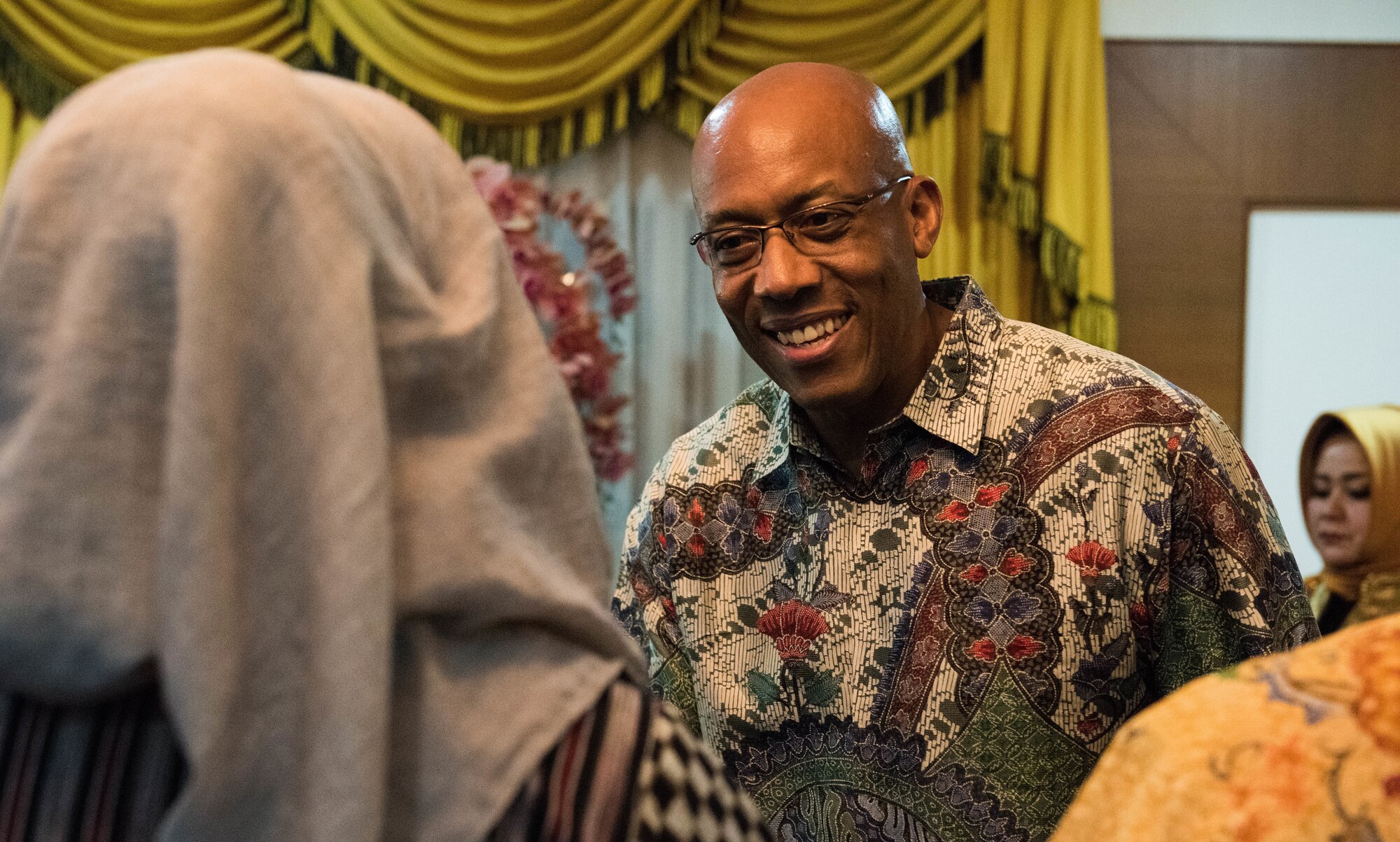 U.S. Air Force Gen. CQ Brown, Jr., Pacific Air Forces commander, is greeted by guests during a dinner hosted by Air Chief Marshal Yuyu Sutinsa, Indonesian Air Force chief of staff, Jakarta, Indonesia, Dec. 12, 2018.