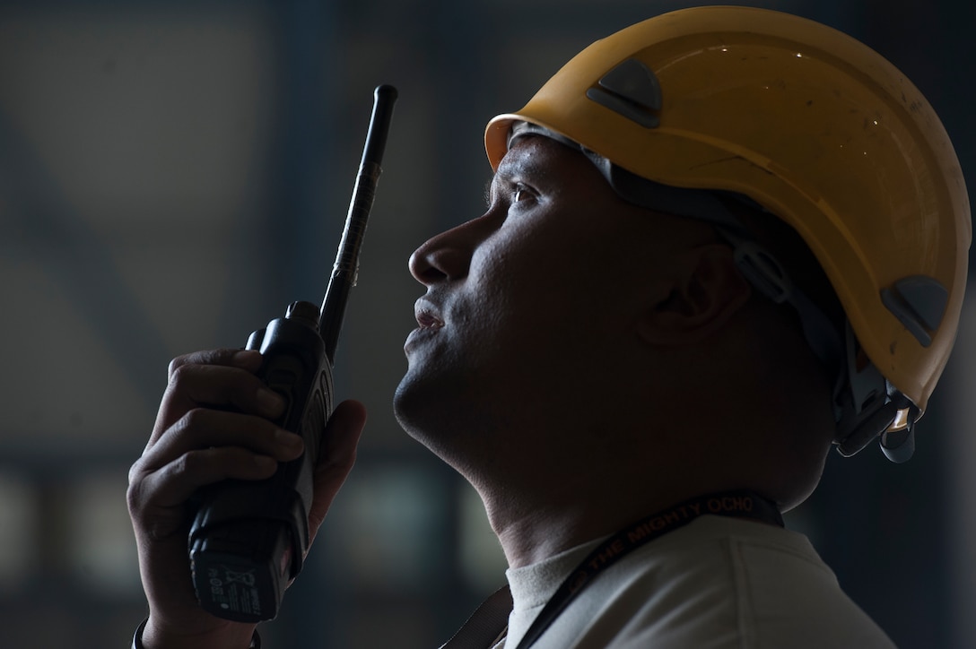 Tech. Sgt. Alejo Blas, 8th Expeditionary Aircraft Maintenance Squadron (EAMS) lead technical crew chief, coordinates the removal and replacement of a pitch trim actuator for a C-17 Globemaster III Dec. 16, 2018, at Al Udeid Air Base, Qatar. This is the first time a maintenance procedure like this has been done in U.S. Air Forces Central Command’s area of responsibility. Due to safety concerns, Airmen from the 8th EAMS and 379th Expeditionary Civil Engineer Squadron combined capabilities to ensure the aircraft could be repaired prior to returning to home station. (U.S. Air Force photo by Tech. Sgt. Christopher Hubenthal)