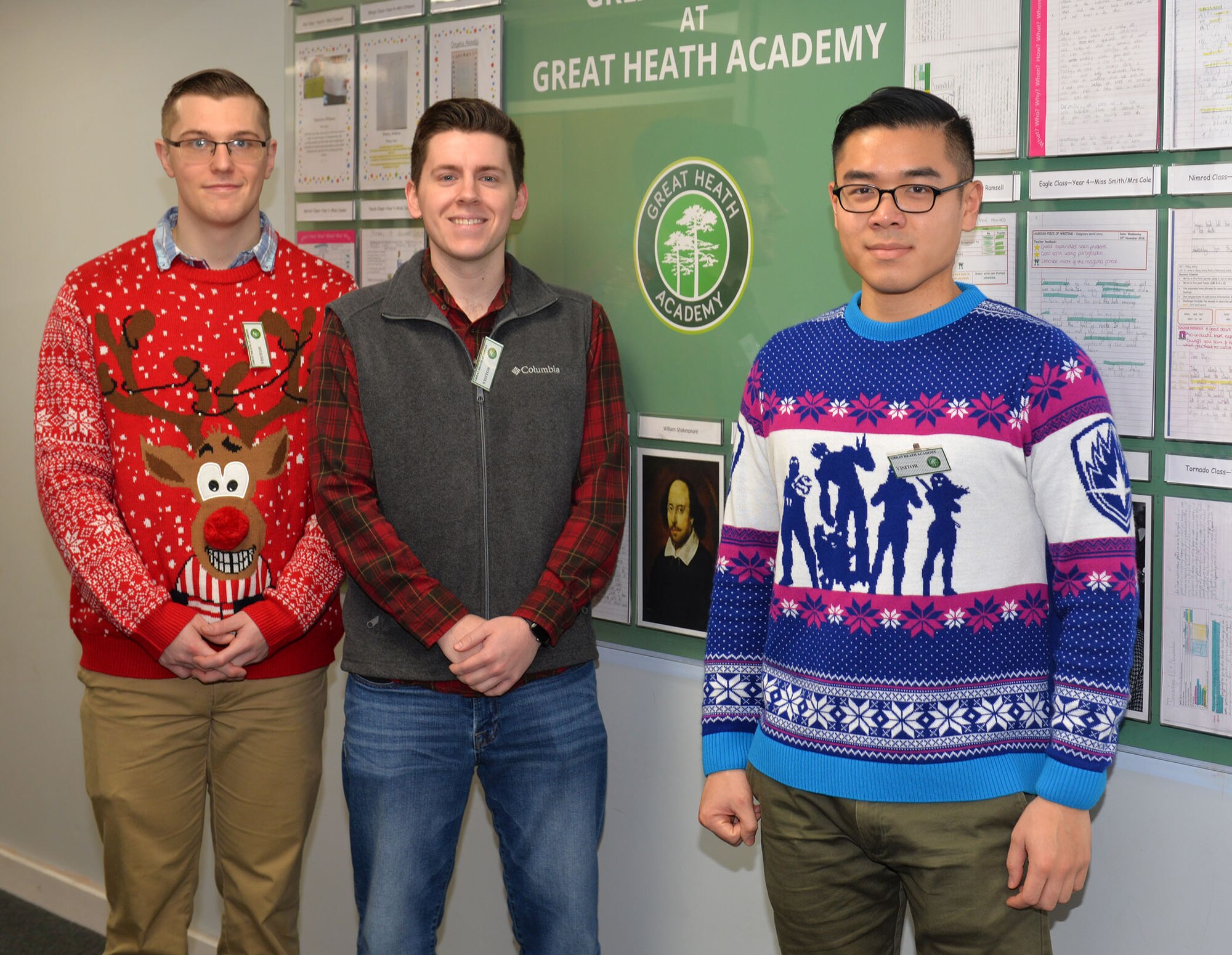 U.S. Air Force Roy Smith, Airman 1st Class Logan Westbrooks and Senior Airman Alan Deng all 100th Communications Squadron members, pose for a photo at Great Heath Academy, Mildenhall, Suffolk, before “Radio Santa” Dec. 18, 2018. Radio Santa is a program run by 100th CS Airmen from RAF Mildenhall, which provides young local school children the opportunity to talk to Santa Claus. The Airmen also visited children at Beck Row Primary Academy. (U.S. Air Force photo by Karen Abeyasekere)