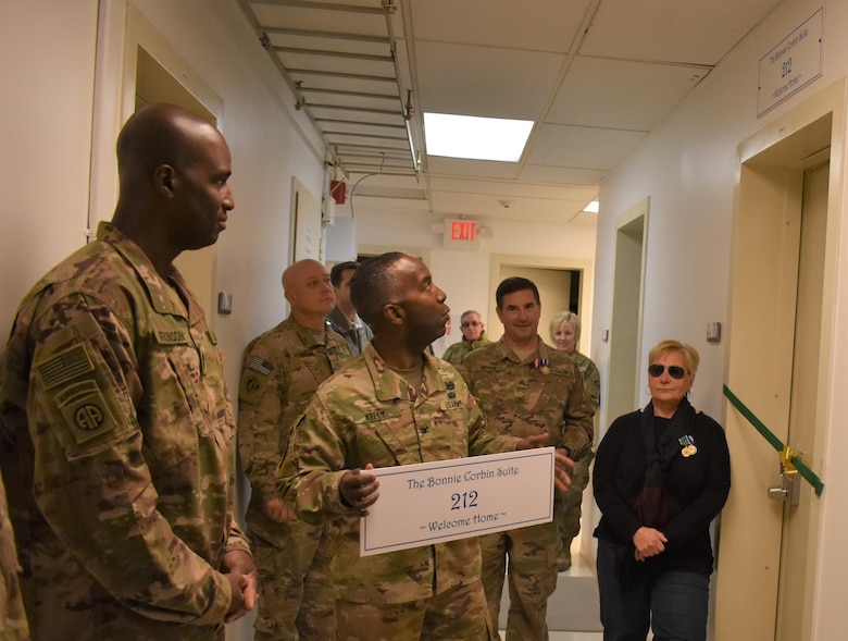 Distinguished Visitors will now be able to spend their time at the Afghanistan District in the Bonnie Corbin Suite, Room 212 as the command and staff dedicated it in Corbin’s name prior to her departure