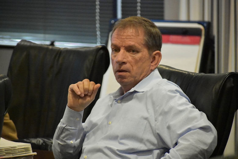 Albert “Chip” Marin III, the programs director of the U.S. Army Engineering and Support Center, Huntsville, listens to project updates during a monthly Project Review Board at the Center in Huntsville, Alabama, Dec. 12, 2018.