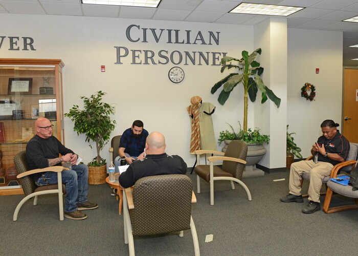 Maintenance job candidates sit in the waiting area on the second floor of Bldg. 3000 Dec. 13. The 412th Test Wing held a one-day direct hiring event where suitable job candidates were invited to Edwards to interview and conduct pre-employment requirements all in one day. (U.S. Air Force photo by Kenji Thuloweit)