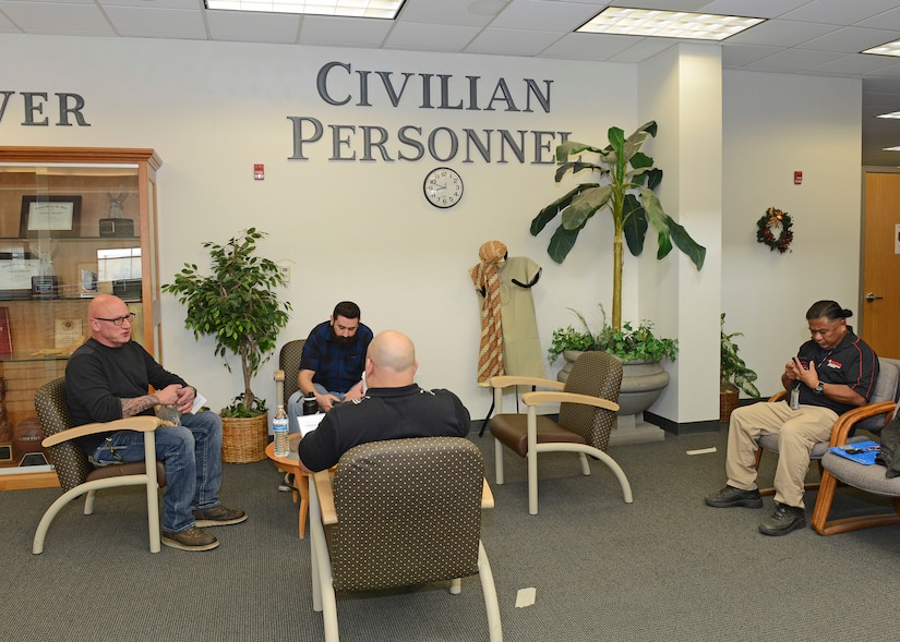 Maintenance job candidates sit in the waiting area on the second floor of Bldg. 3000 Dec. 13. The 412th Test Wing held a one-day direct hiring event where suitable job candidates were invited to Edwards to interview and conduct pre-employment requirements all in one day. (U.S. Air Force photo by Kenji Thuloweit)