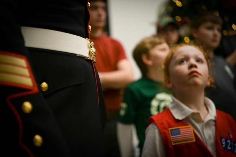 Staff Sgt. Terry Allen Davis Jr., left, 451st Combat Logistics Battalion training chief, looks on as a local business unveils the number of gifts they donated Dec. 14, 2018, on Johns Island, S.C. All of the toys were donated by individuals and businesses within the Lowcountry and given to those in the community who may have for one reason or another fallen on hard times during the holiday season. The goal of the program is to, help bring the joy of Christmas and send a message of hope to America's less fortunate children through the gift of a new toy.