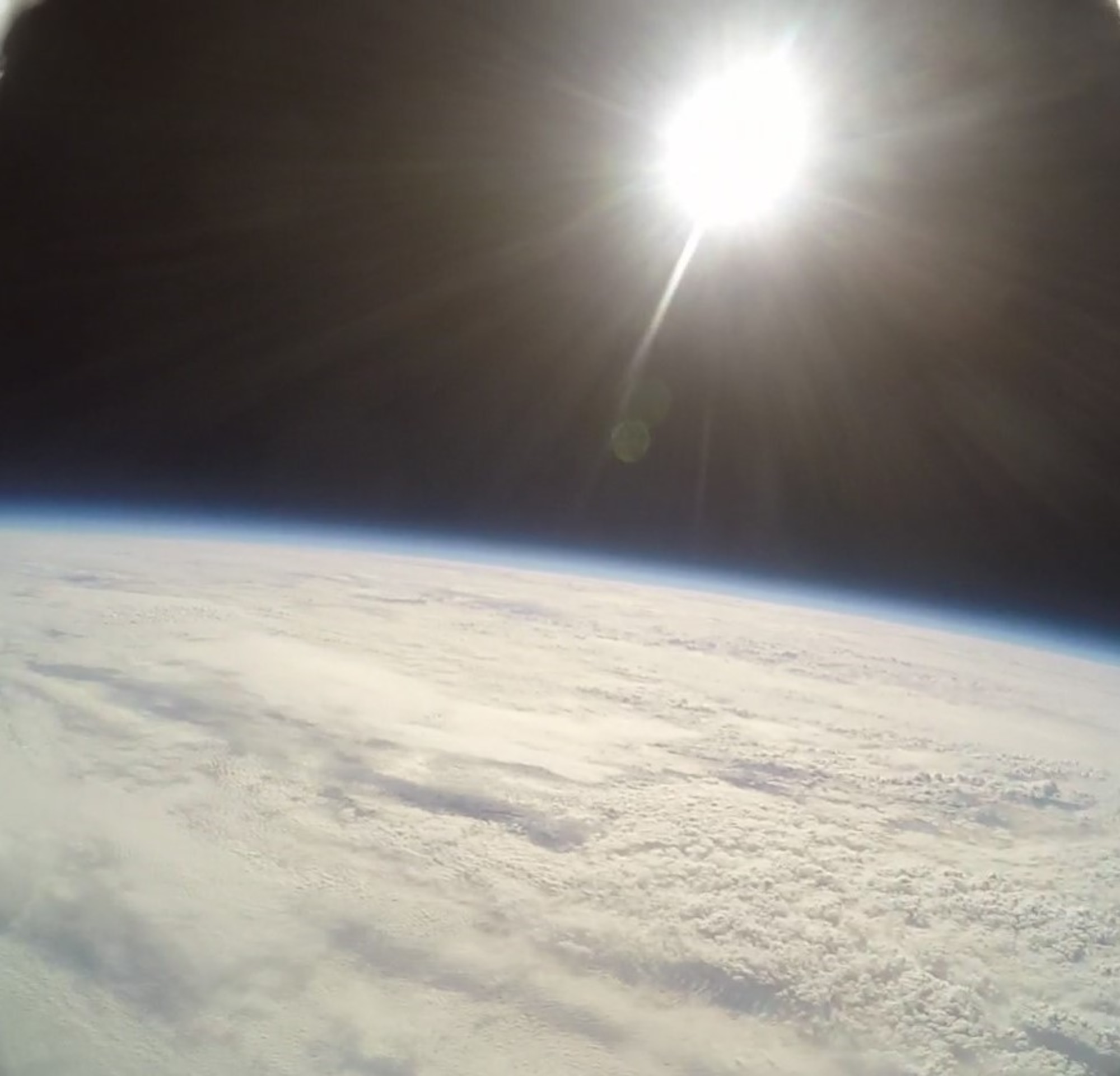 A GoPro attached to a high-altitude computer and floating over Illinois records the sun and horizon over earth, which was done as part of a final project for a group of eighth grade students from three schools, Nov. 30, 2018. The balloon reached a maximum altitude of 22.5 miles and recorded a temperature low of 67 degrees Fahrenheit. The balloon launch was made possible through an Air Force science, technology, engineering, and mathematics grant.