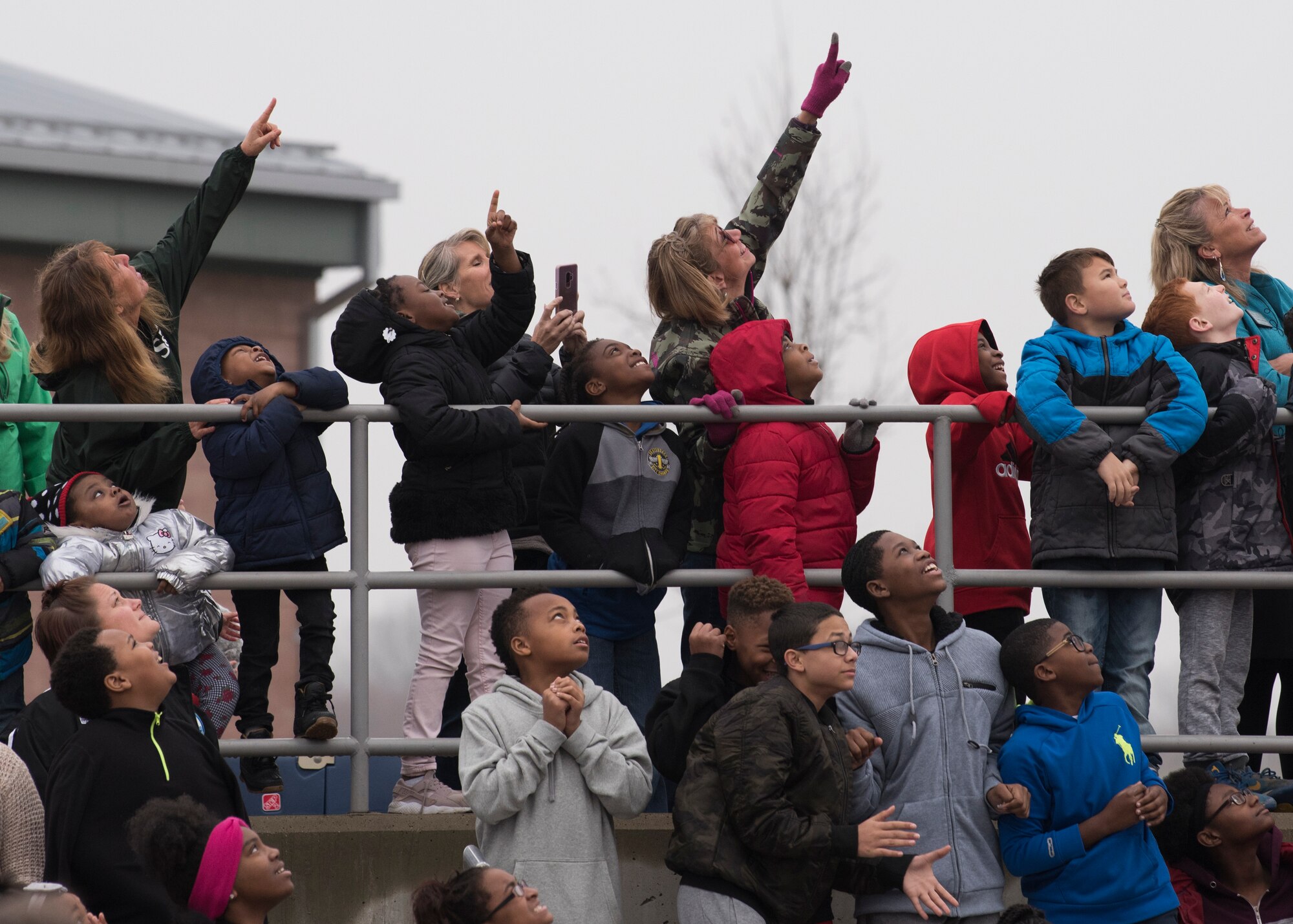 Belle Valley School students watch as a high-altitude computer floats into the sky, Nov. 30, 2018, Belleville, Illinois. Three schools, Emge Junior High School, Smithton Middle School and Belle Valley School, worked together to launch a balloon that carried a high-altitude computer, which analyzed data ranging from altitude and coordinates traveled to temperature and pressure. The students found the popped balloon 140 miles away in Mount Carmel, Illinois. The project made possible through an Air Force science, technology, engineering, and mathematics grant.