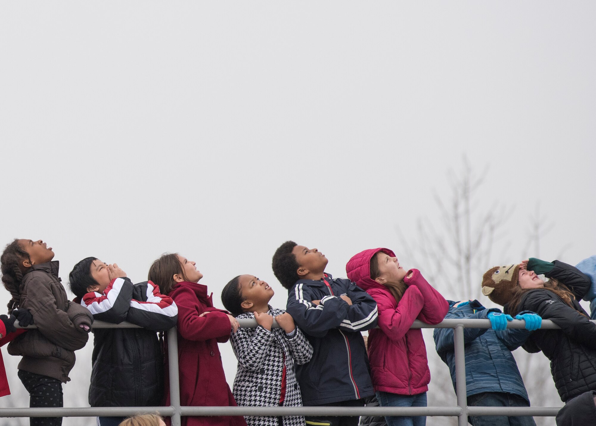 Belle Valley School students watch as a high-altitude computer floats into the sky, Nov. 30, 2018, Belleville, Illinois. Three schools, Emge Junior High School, Smithton Middle School and Belle Valley School, worked together to launch a balloon that carried a high-altitude computer, which analyzed data ranging from altitude and coordinates traveled to temperature and pressure. The students found the popped balloon 140 miles away in Mount Carmel, Illinois. The project made possible through an Air Force science, technology, engineering, and mathematics grant.