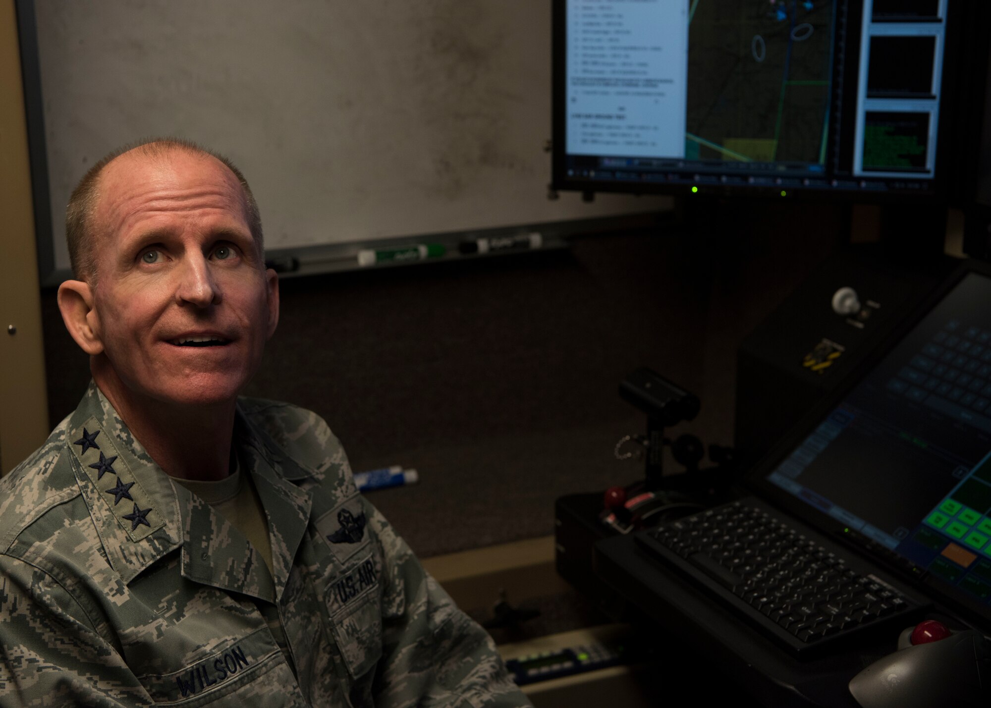 Air Force Vice Chief of Staff Gen. Stephen Wilson receives a briefing in an MQ-9 Reaper cockpit on Holloman Air Force Base, N.M., November 30. Wilson received a tour of Holloman, home to the Air Force’s only MQ-9 pilot and sensor operator Formal Training Unit. (U.S. Air Force photo by Staff Sgt. BreeAnn Sachs)