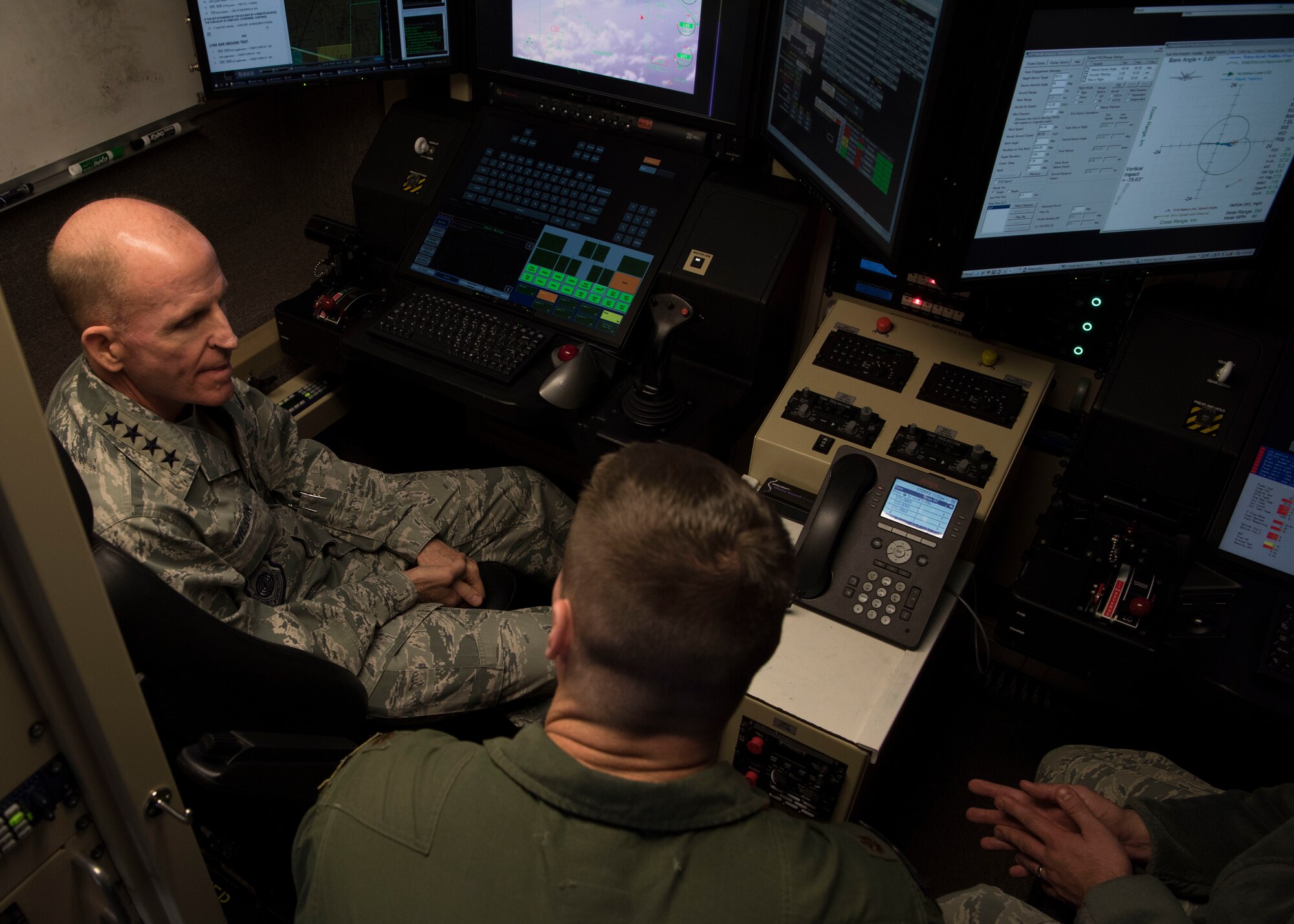 Air Force Vice Chief of Staff Gen. Stephen Wilson receives a briefing in an MQ-9 Reaper cockpit on Holloman Air Force Base, N.M., November 30. Wilson received a tour of Holloman, home to the Air Force’s only MQ-9 pilot and sensor operator Formal Training Unit. (U.S. Air Force photo by Staff Sgt. BreeAnn Sachs)