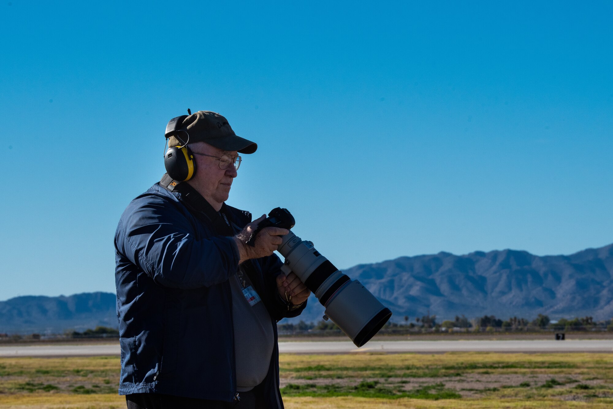 Harvey Brugger, 56th Operations Support Squadron air traffic controller, looks over his flight line imagery, Dec. 13, 2018, at Luke Air Force Base, Ariz.