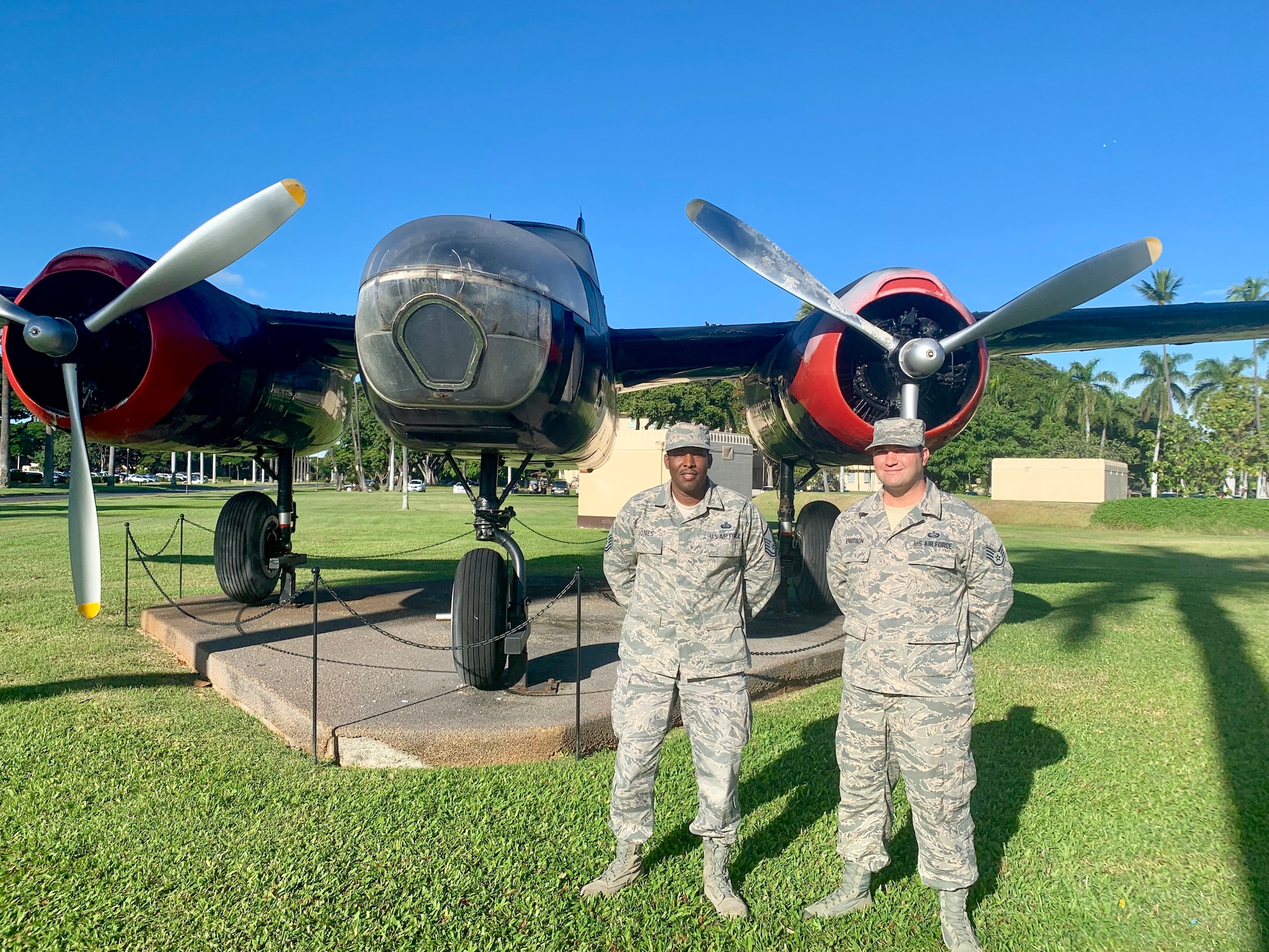 Master Sgt. Shamar Jones, 690th Cyber Operations Squadron, and Staff Sgt. David Knutson, 647th Force Support Squadron, along with Capt. Tiffany Harwood, 15th Medical Operations Squadron, who was unavailable for a photo, won first place in the first-ever Aloha Spark competition. Their idea to implement signs alerting drivers to turn around prior to reaching the base garnered 131 “likes” on the 15th Wing Facebook page. Col. Halsey Burks, 15th Wing commander, announced the Joint Base Pearl Harbor-Hickam leadership is currently working with the State of Hawaii on this issue. (U.S. Air Force photo by 2nd Lt. Amber R. Kelly-Herard)