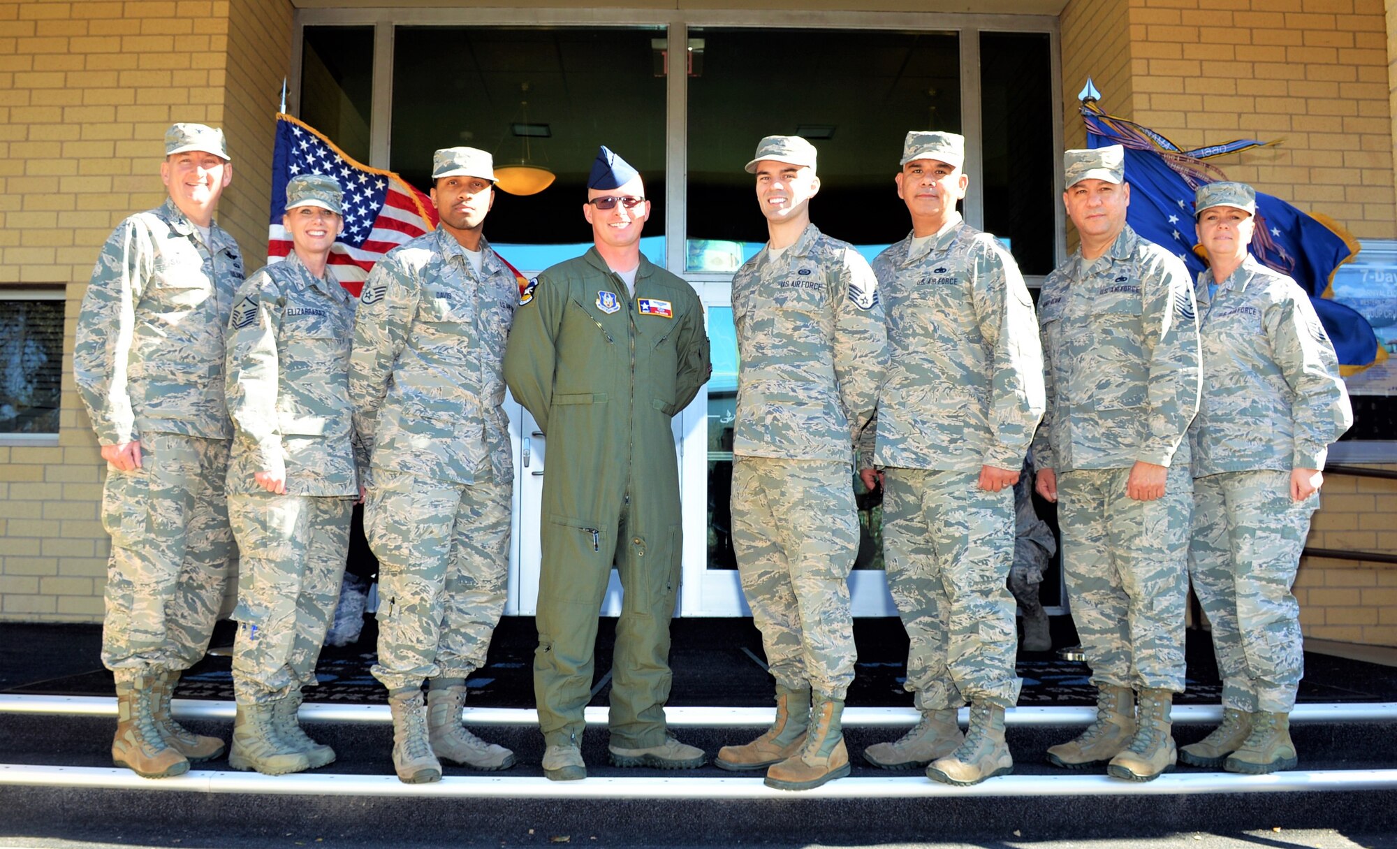 The 433rd Airlift Wing held a joint Community College of the Air Force graduation ceremony Nov. 17, here at the Defense Language Institute’s International Hall.