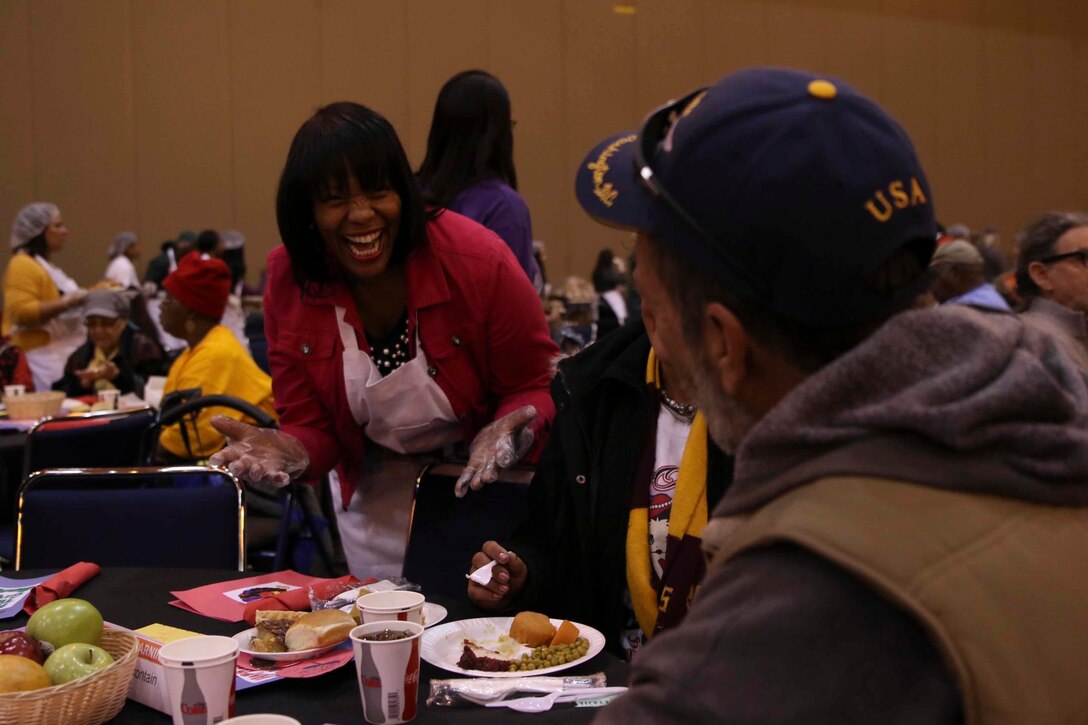 Judge Tamia Gordon, a former U.S. Marine Corps major, serves a Thanksgiving meal at the New Orleans Convention Center, Nov. 22, 2018. 



“My favorite part of the program (Bayou Classic) is the community service event at the Convention Center, where Marines join local New Orleans volunteers in serving Thanksgiving meals to thousands who would not have meals otherwise,” said Gordon. 



Gordon currently serves as the associate chief administrative law judge for the Department of Health and Human Services, Office of Medicare Hearings and Appeals, at the New Orleans Field Office. (U.S. Marine Corps photo by Sgt. Nathaniel Cray/Released)
