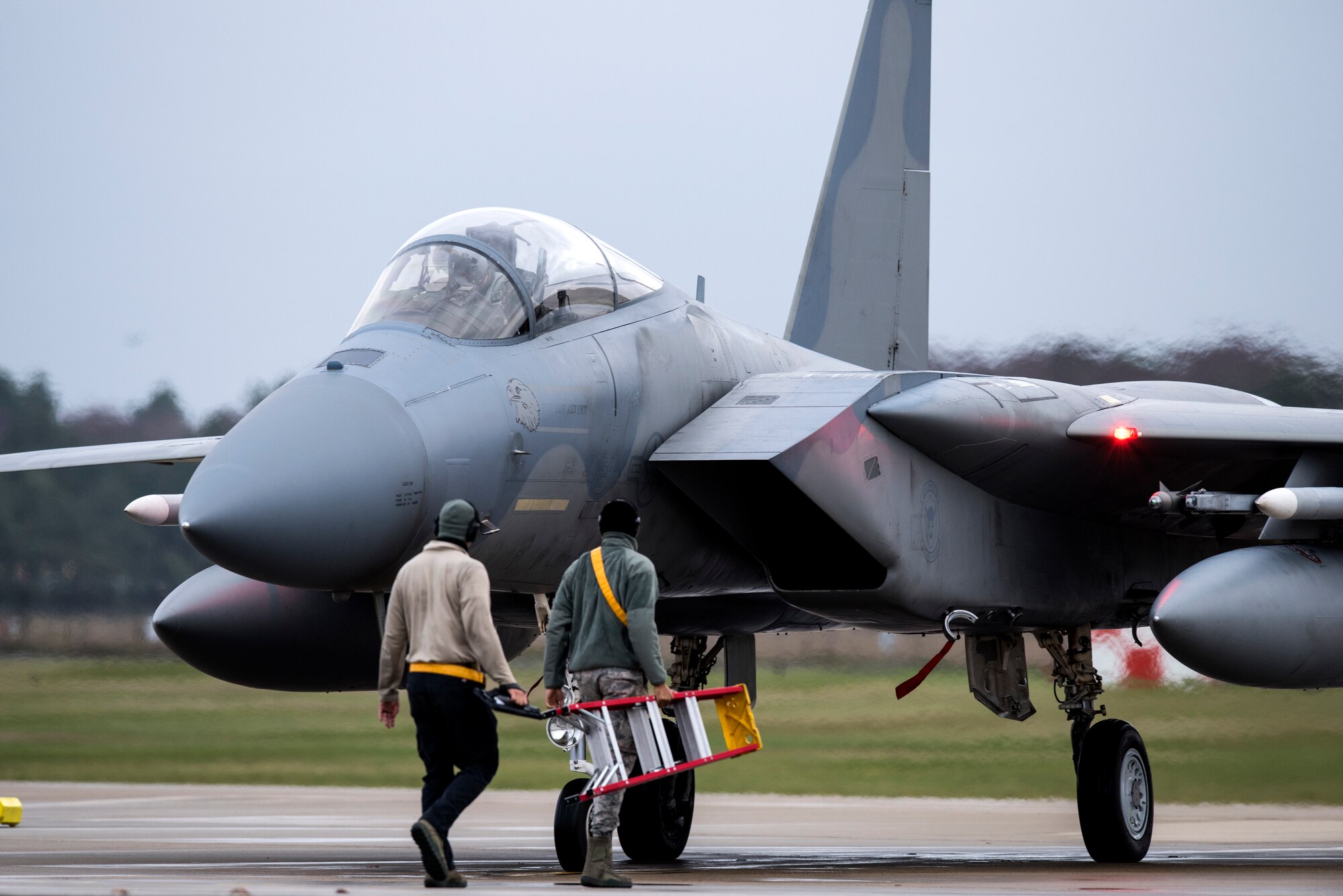 Maintainers assigned to the 48th Maintenance Group prepare an F-15C Eagle assigned to the 493rd Fighter Squadron for a sortie at Royal Air Force Lakenheath, England, Dec. 18, 2018. The 48th MXG is responsible for all organizational and intermediate level maintenance for F-15C Eagle, F-15D Eagle, F-15E Strike eagle, engines, munitions and support equipment used to accomplish U.S. Air Forces in Europe, U.S. European command and NATO commitments and taskings. (U.S. Air Force photo by Senior Airman Malcolm Mayfield)