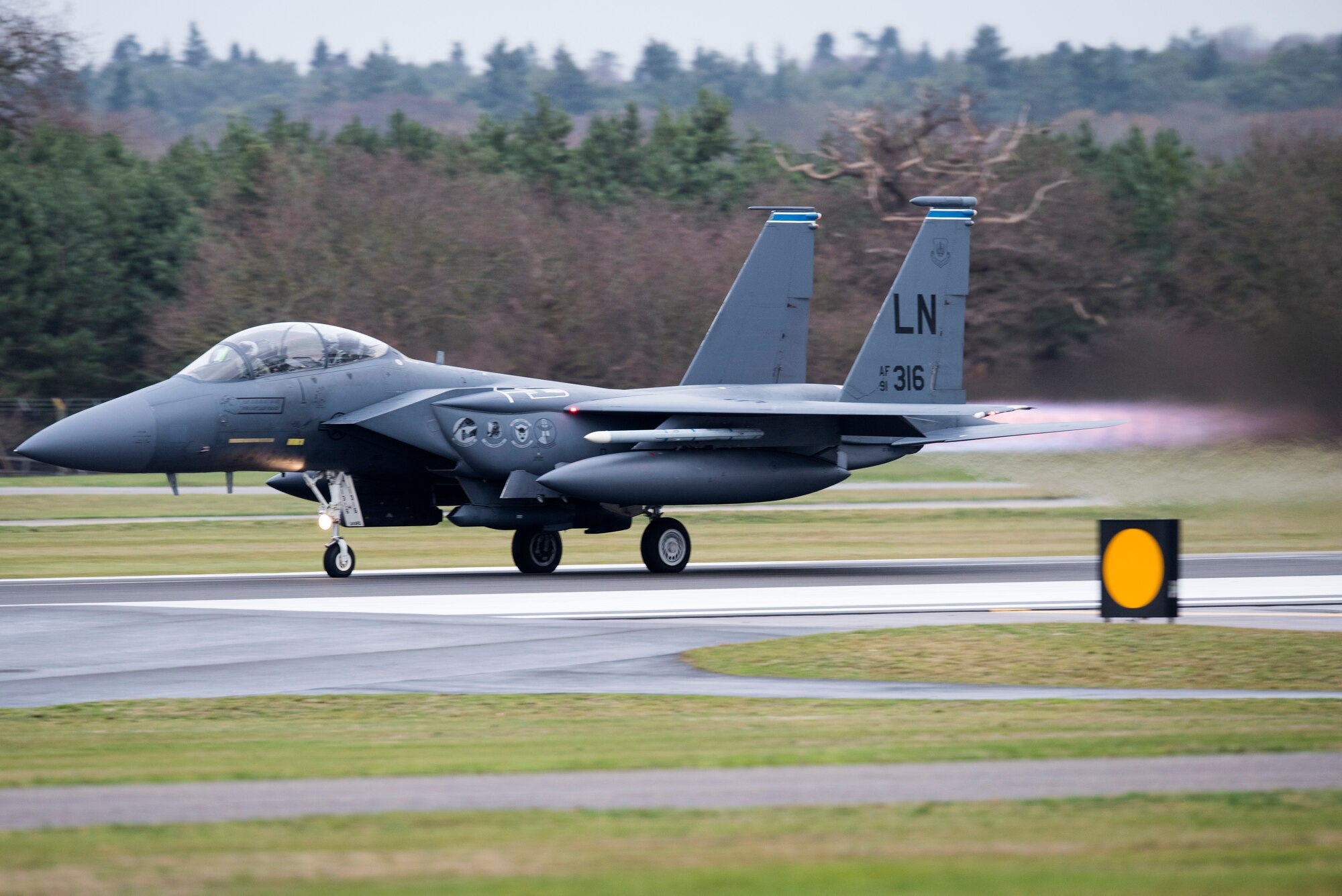 An F-15E Strike Eagle assigned to the 492nd Fighter Squadron takes off from Royal Air Force Lakenheath, England, Dec. 18, 2018. The Strike Eagle is a dual-role fighter designed to perform air-to-air and air-to-ground missions. An array of avionics and electronics systems gives the F-15E the capability to fight at low altitude, day or night, and in all weather. (U.S. Air Force photo by Senior Airman Malcolm Mayfield)