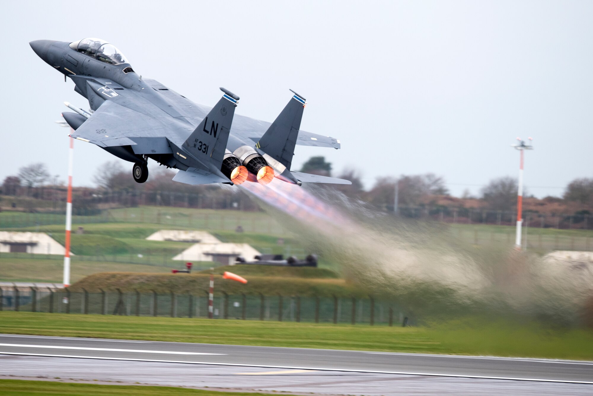 An F-15E Strike Eagle assigned to the 492nd Fighter Squadron takes off from Royal Air Force Lakenheath, England, Dec. 18, 2018. The Strike Eagle is a dual-role fighter designed to perform air-to-air and air-to-ground missions. An array of avionics and electronics systems gives the F-15E the capability to fight at low altitude, day or night, and in all weather. (U.S. Air Force photo by Senior Airman Malcolm Mayfield)