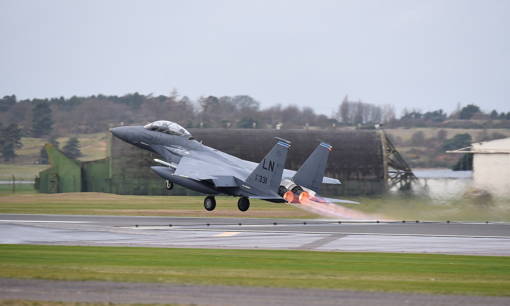 An F-15E Strike Eagle assigned to the 492nd Fighter Squadron takes off for a sortie at Royal Air Force Lakenheath, England, Dec. 18, 2018. The Strike Eagle is a dual-role fighter designed to perform air-to-air and air-to-ground missions. An array of avionics and electronics systems gives the F-15E the capability to fight at low altitude, day or night, and in all weather. (U.S. Air Force photo by Madeline Herzog)