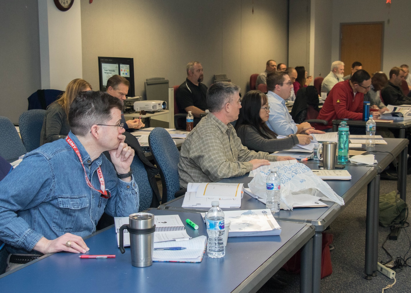 "Personnel from the U.S. Army Transatlantic Division, Transatlantic Middle East District and U.S. Army Central Command attend the Project Management "Boot Camp" course held in December in Winchester, Virginia. The course is intended to prepare project management professionals to take the PMP certification exam. The PMP certification is the most recognized form of accreditation offered in the project management career field and is known for being very difficult to earn."