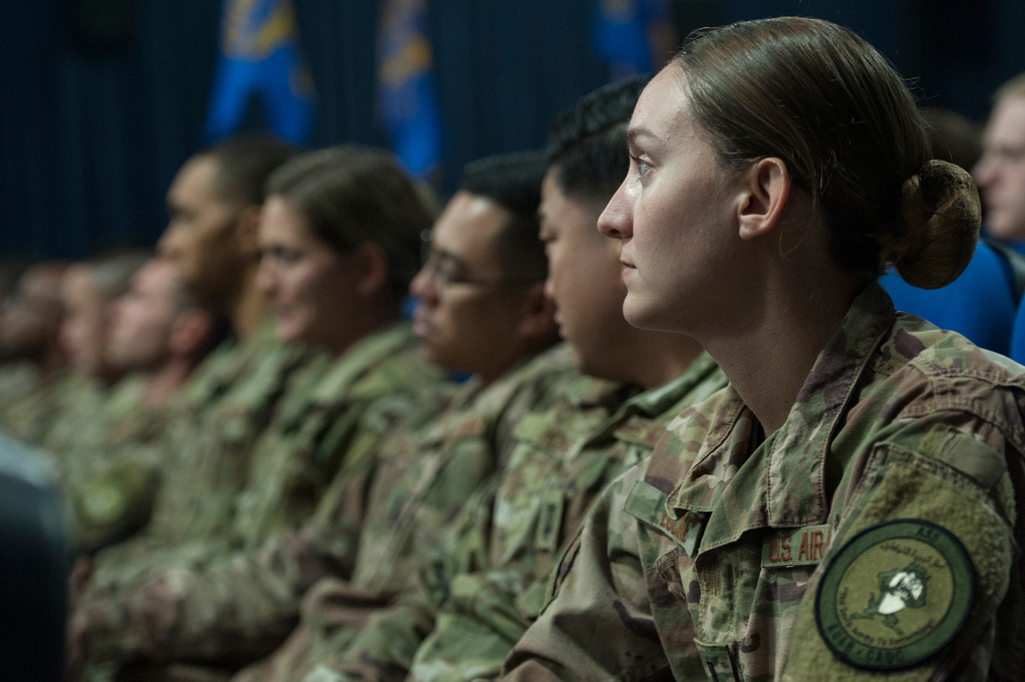 Airmen listen to U.S. Air Force Chief of Staff Gen. David L. Goldfein and Chief Master Sgt. of the Air Force Kaleth O. Wright during a base-wide “all call” at Al Udeid Air Base, Qatar, Dec. 19, 2018. During the all call, Goldfein and Wright emphasized their gratitude for the safety and security provided by Airmen serving at Al Udeid. (U.S. Air Force photo by Tech. Sgt. Christopher Hubenthal)