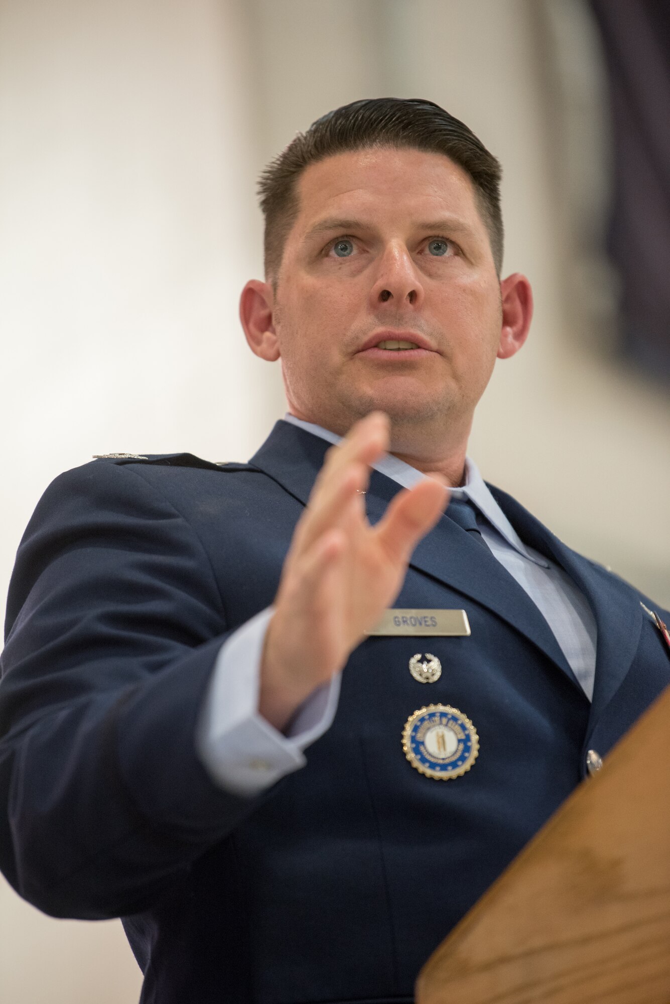 Col. Ashley Groves, incoming commander of the 123rd Maintenance Group, addresses the crowd during a ceremony at the Kentucky Air National Guard Base in Louisville, Ky., on Dec. 1, 2018. Groves is replacing Col. Ken Dale, who is retiring after more than 38 years of service to the Kentucky Air National Guard. (U.S. Air National Guard photo by Staff Sgt. Joshua Horton)