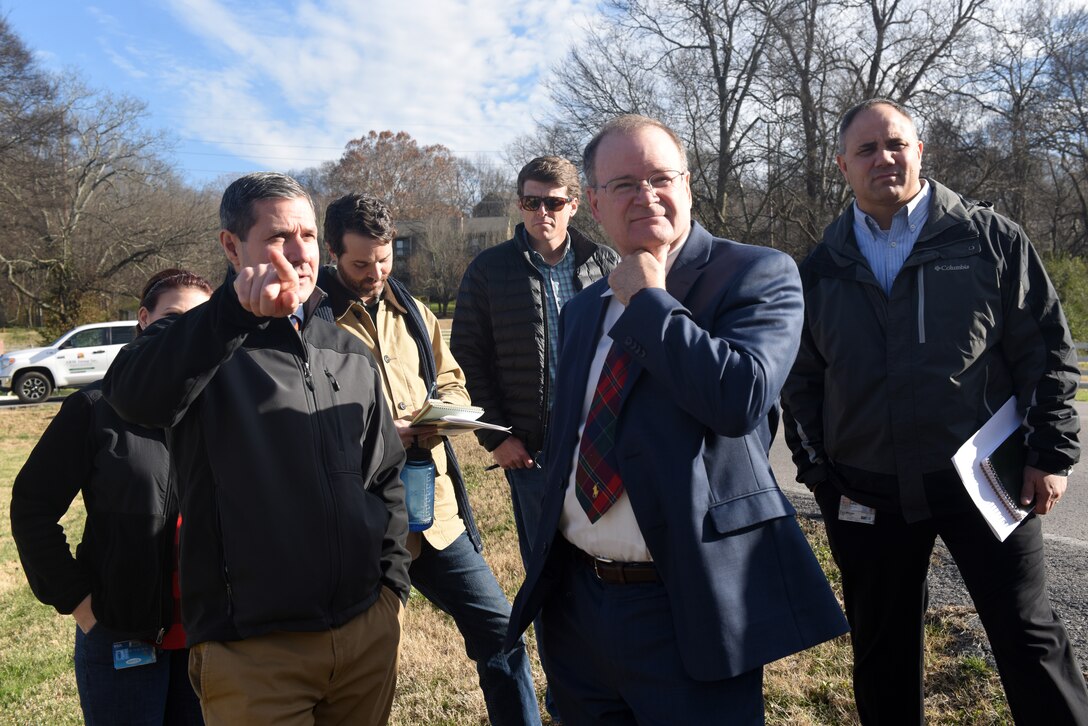Craig Carrington (Left), U.S. Army Corps of Engineers Nashville District Planning Branch’s chief of Plan Formulation, points out site specifics Dec. 18, 2018 of where Ellington Dry Dam will be located near Ellington Agricultural Center in Nashville, Tenn., while meeting with Stephen G. Durrett (wearing tie), programs director, professional engineer and member of Senior Executive Service with the U.S. Army Corps of Engineers Great Lakes and Ohio River Division. (USACE photo by Lee Roberts)