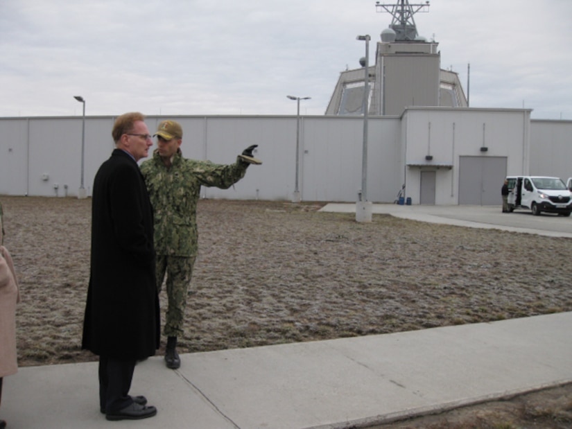 Navy Cmdr. Axel Steiner, right, commanding officer of U.S. Aegis Ashore Missile Defense System, gives Navy Undersecretary Thomas B. Modly a tour system at Naval Support Facility Deveselu, Romania.