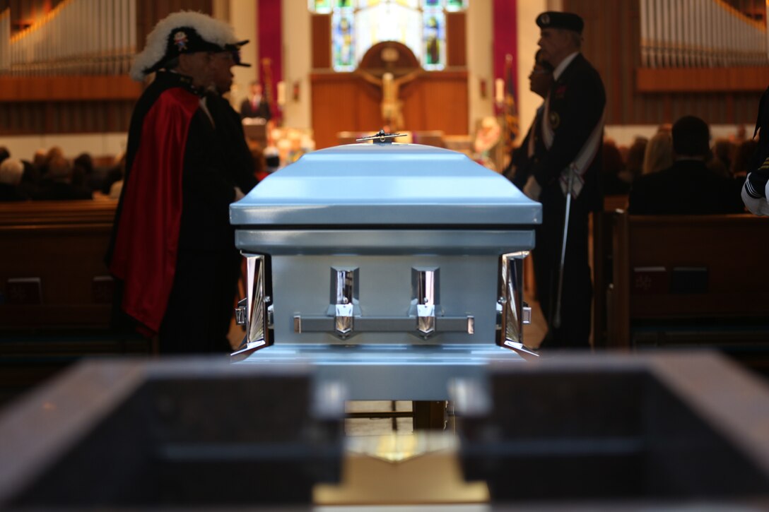 Members of the Knights of Columbus Color Corps assist in escorting Raymond Chavez’s casket into St. Michael’s church during his funeral ceremony in San Diego, Dec. 13. Chavez was aboard the USS Condor during the attack on Pearl Harbor Dec. 7, 1941 and passed away at the age of 106 on Nov. 21, 2018 as the oldest veteran Pearl Harbor survivor. (U.S. Marine Corps photo by Sgt. Jake McClung)