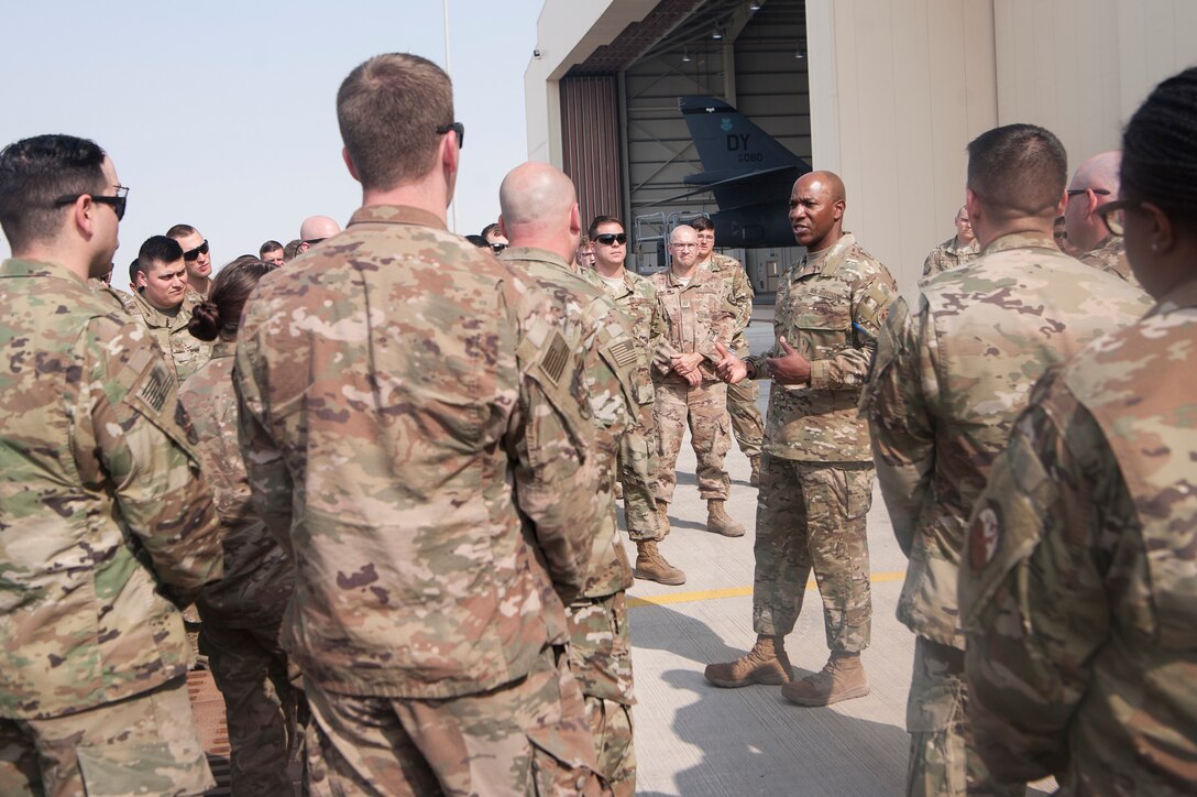 Chief Master Sgt. of the Air Force Kaleth O. Wright, answers questions from Airmen during a base tour at Al Udeid Air Base, Qatar, Dec. 20, 2018. Wright talked about a variety of topics including potential changes to the promotion system and gave advice on how to lead at all levels in the U.S. Air Force. (U.S. Air Force photo by Tech. Sgt. Christopher Hubenthal)