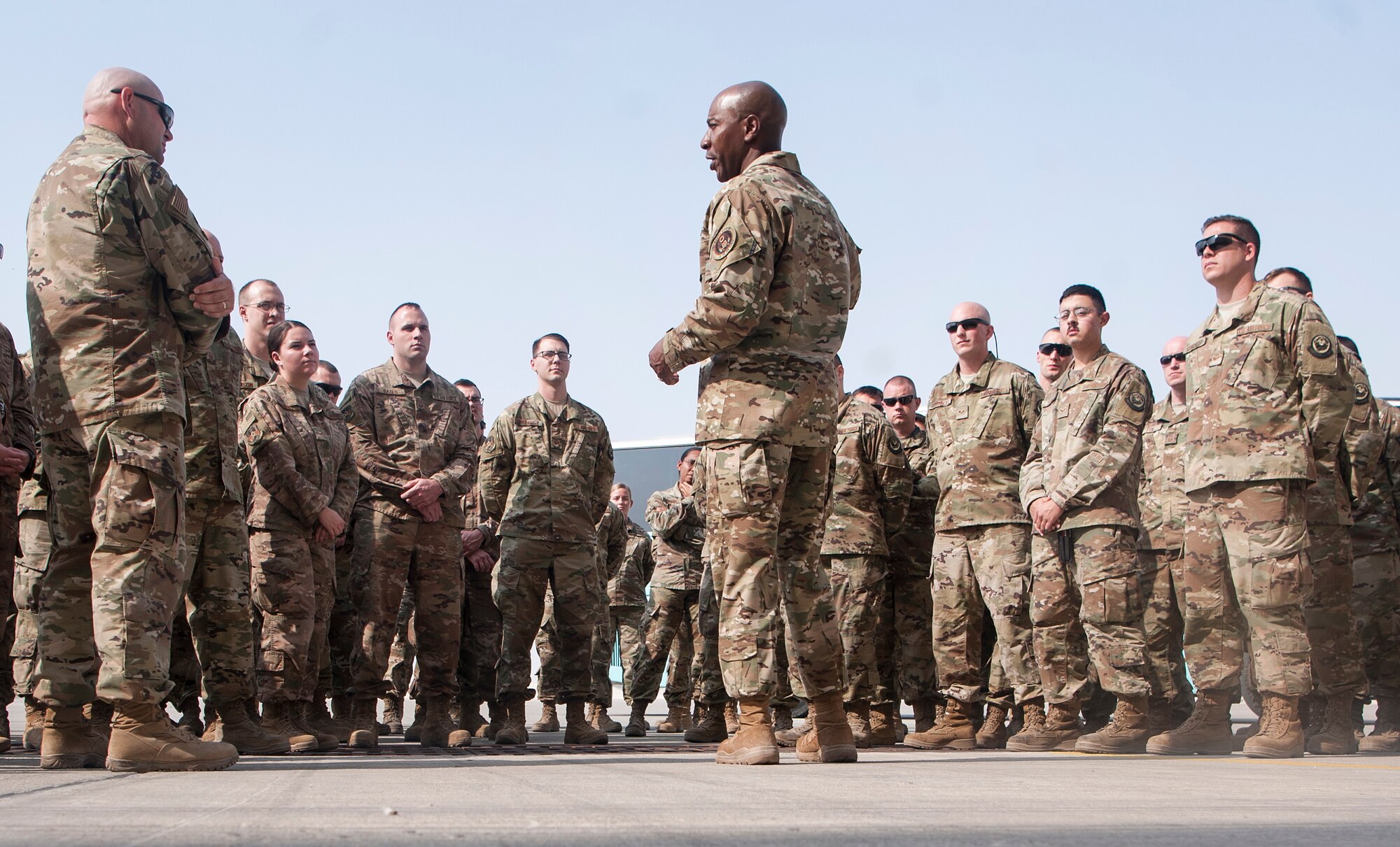 Chief Master Sgt. of the Air Force Kaleth O. Wright answers questions from Airmen during a base tour at Al Udeid Air Base, Qatar, Dec. 20, 2018. During his visit, Wright offered Airmen the acronym “CADET” as a leadership tool, encouraging Airmen to utilize character, attitude, discipline, excellence, and teamwork in their careers. (U.S. Air Force photo by Tech. Sgt. Christopher Hubenthal)