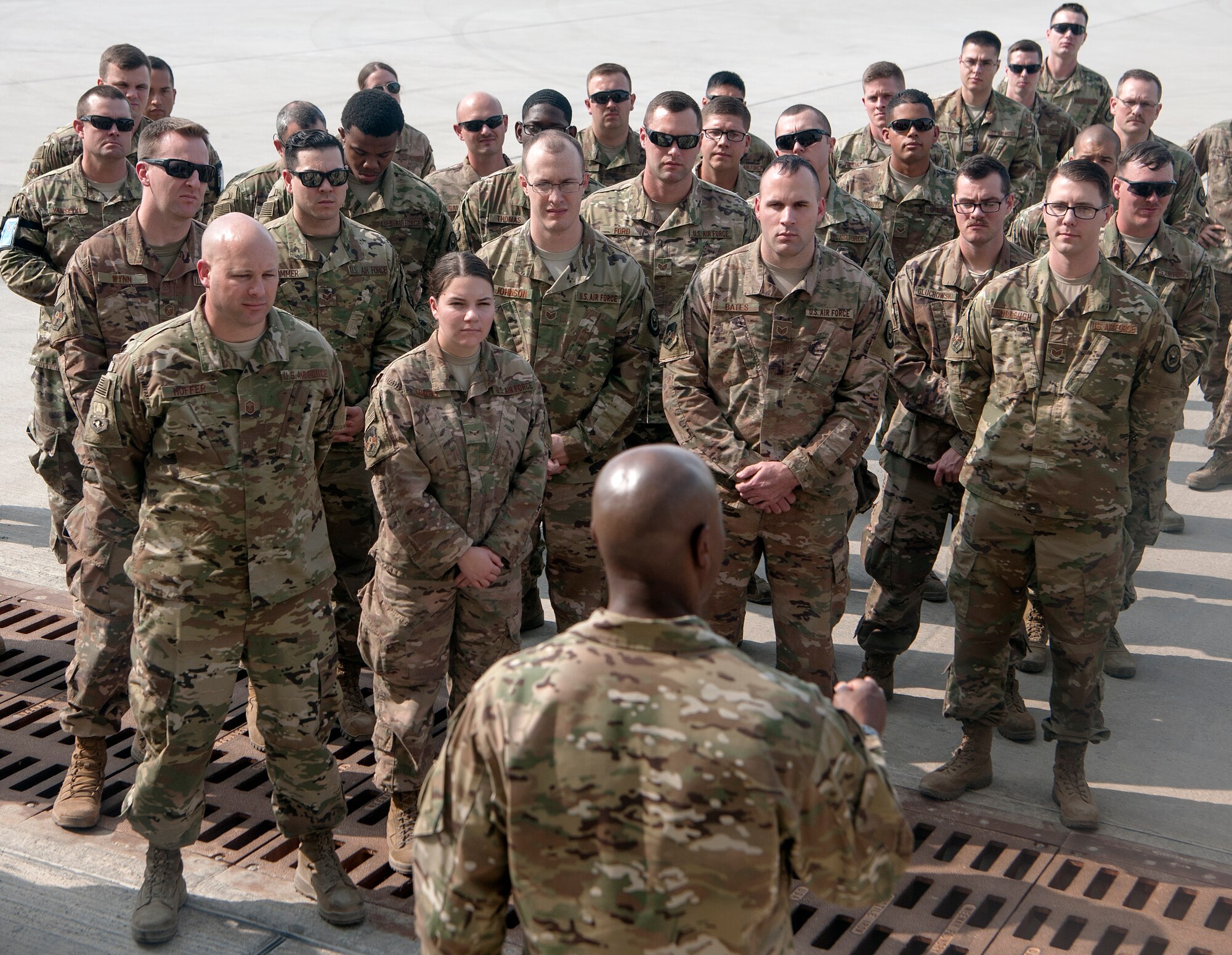 Chief Master Sgt. of the Air Force Kaleth O. Wright answers questions from Airmen during a base tour at Al Udeid Air Base, Qatar, Dec. 20, 2018. Wright’s tour included a visit to dining facilities, dormitory buildings, a recently completed construction site and the 379th Expeditionary Maintenance Squadron’s wheel and tire shop. (U.S. Air Force photo by Tech. Sgt. Christopher Hubenthal)