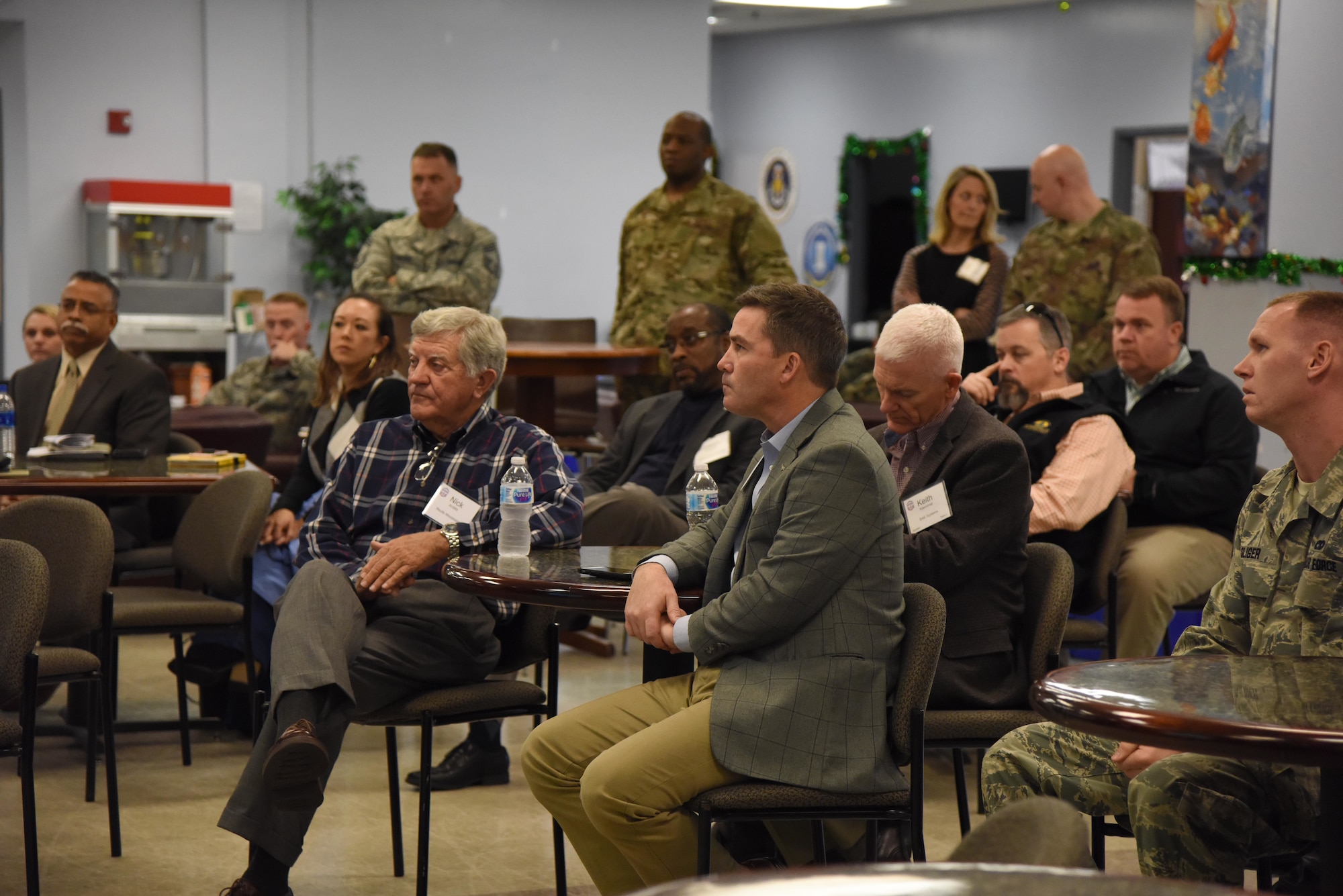 Keesler personnel and members of the Governor's Defense Initiative Task Force attend an 81st Training Wing mission brief on Keesler Air Force Base, Mississippi, Dec. 13, 2018. Keesler hosted the delegation in order to engage in discussion about making Mississippi a more attractive place for Airmen and their families and to attract more defense industry. (U.S. Air Force photo by Kemberly Groue)