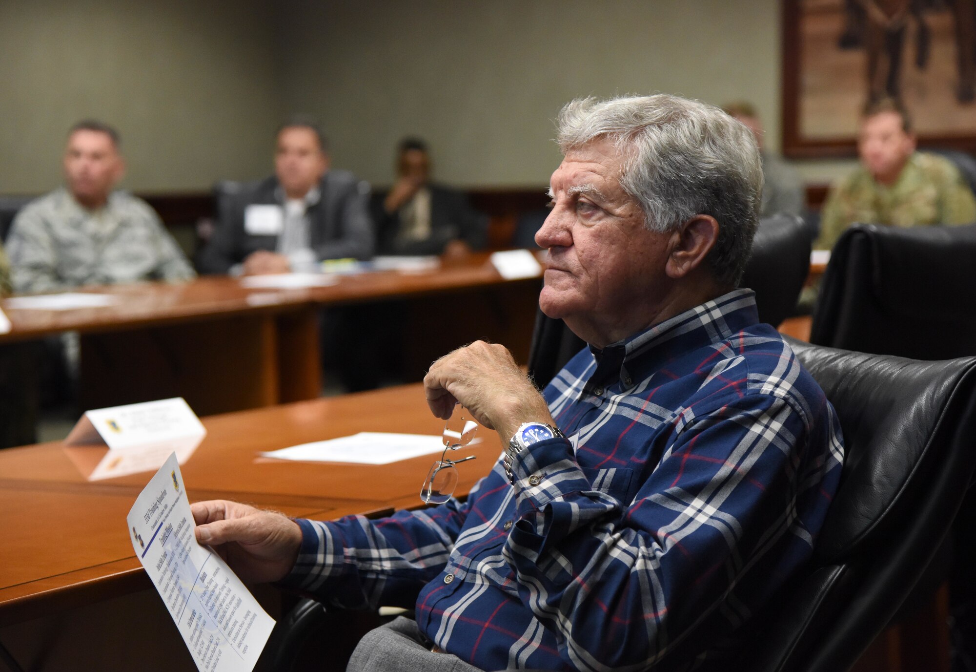 Nick Ardillo, Results Mississippi Consulting Group consultant, attends a 333rd Training Squadron briefing during the Governor's Defense Initiative Task Force tour on Keesler Air Force Base, Mississippi, Dec. 13, 2018. Keesler hosted the delegation in order to engage in discussion about making Mississippi a more attractive place for Airmen and their families and to attract more defense industry. (U.S. Air Force photo by Kemberly Groue)