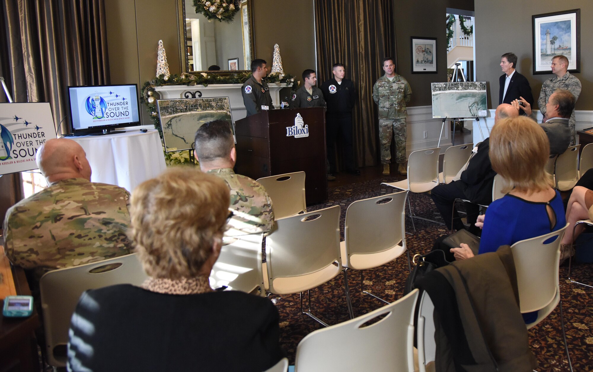 U.S. Air Force Col. Lance Burnett, 81st Training Wing vice commander, delivers remarks during a press conference formally announcing Thunder Over the Sound: The Keesler and Biloxi Air and Space Show at the Biloxi Visitors Center, in Biloxi, Mississippi, Dec. 18, 2018. Burnett was joined by Andrew "Fo Fo" Gilich, Biloxi mayor, and two U.S. Air Force Thunderbird pilots at the press conference which reviewed and confirmed information and acts for the air show and allowed attendees to meet with and ask questions of all speakers. (U.S. Air Force photo by Kemberly Groue)