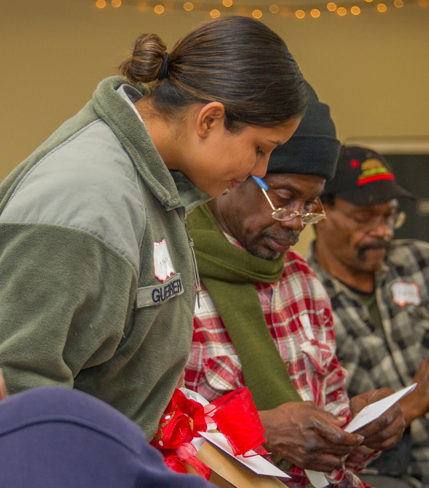 Reserve Citizen and active-duty Airmen from Barksdale Air Force Base along with members of Volunteers of America North Louisiana brought gifts and prepared a meal for a Christmas party at the Safe Haven shelter for homeless veterans, in Shreveport, Louisiana, December 19, 2018. (U.S. Air Force photo by Airman 1st Class Maxwell Daigle)